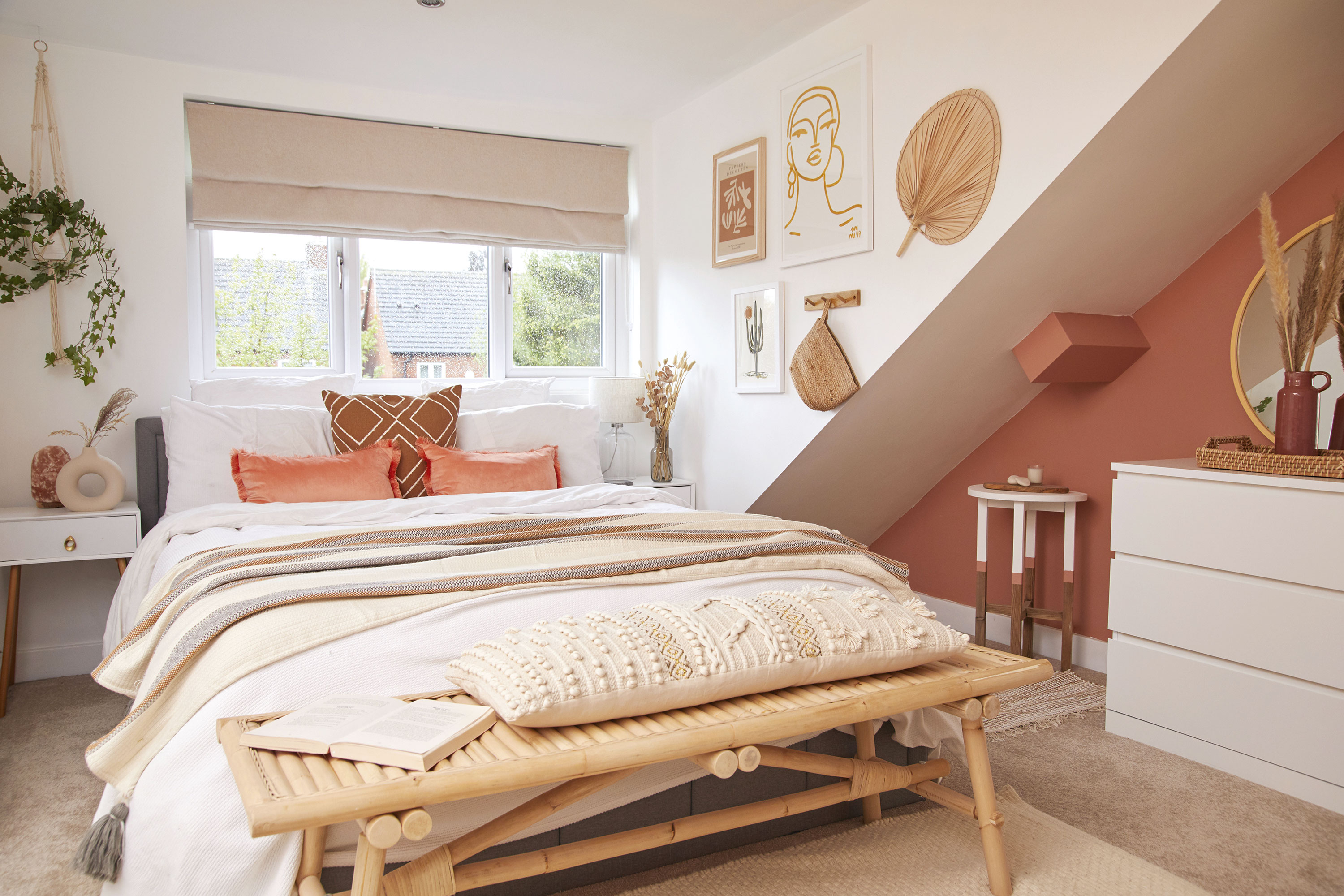 ‘I found the stool on the side of the road, sanded it down and painted it to match the room. I added gold Zara Home handles to add a bit of bling to the B&M bedside tables. The TÄNKVÄRD bamboo bench is from IKEA’