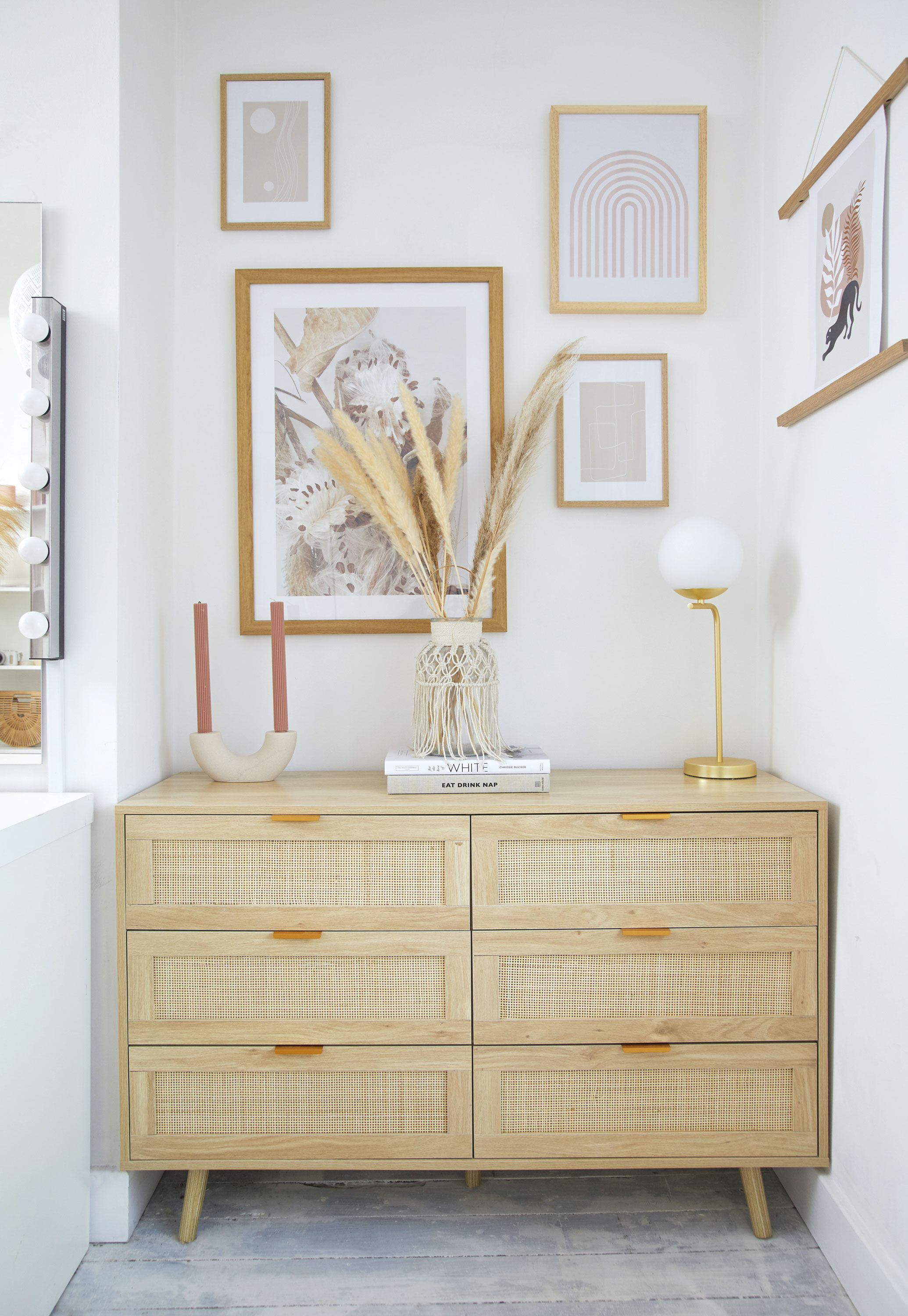 'DIY hacks have saved us a fortune' ‘I love a gallery wall and choose prints with colours that suit each room. I wanted light pink and neutral tones in here, and played around with scale for a less structured feel’