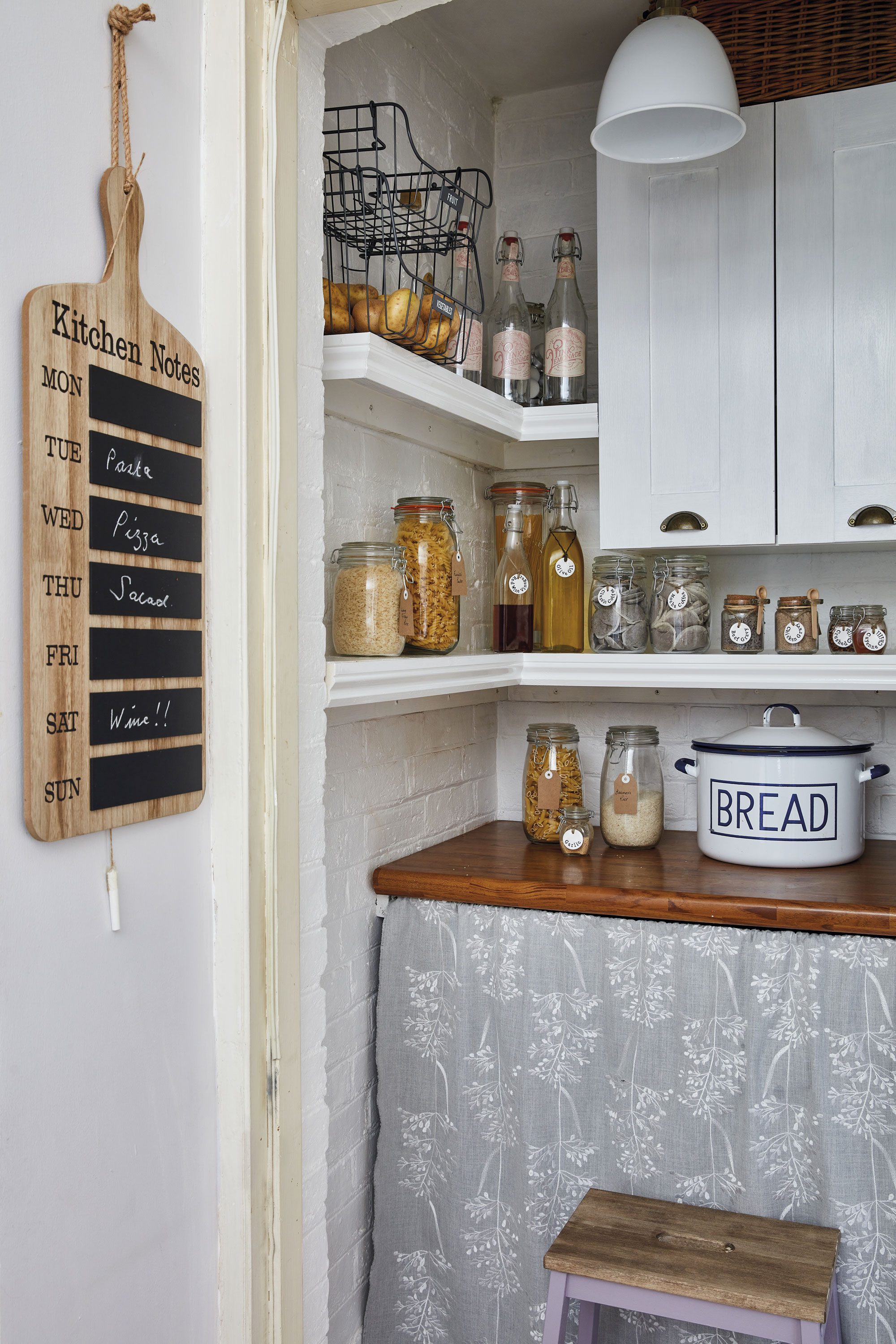 The little pantry provides much-needed storage space in the kitchen. ‘It used to have everything just thrown in there, until we put in the little cupboards, re-did the shelving and changed the light fitting,’ Sharon says. ‘The wooden worktop was covered by ugly vinyl plastic, which we peeled off.’ The little curtain hides the washing machine The little pantry provides much-needed storage space in the kitchen. ‘It used to have everything just thrown in there, until we put in the little cupboards, re-did the shelving and changed the light fitting,’ Sharon says. ‘The wooden worktop was covered by ugly vinyl plastic, which we peeled off.’ The little curtain hides the washing machine