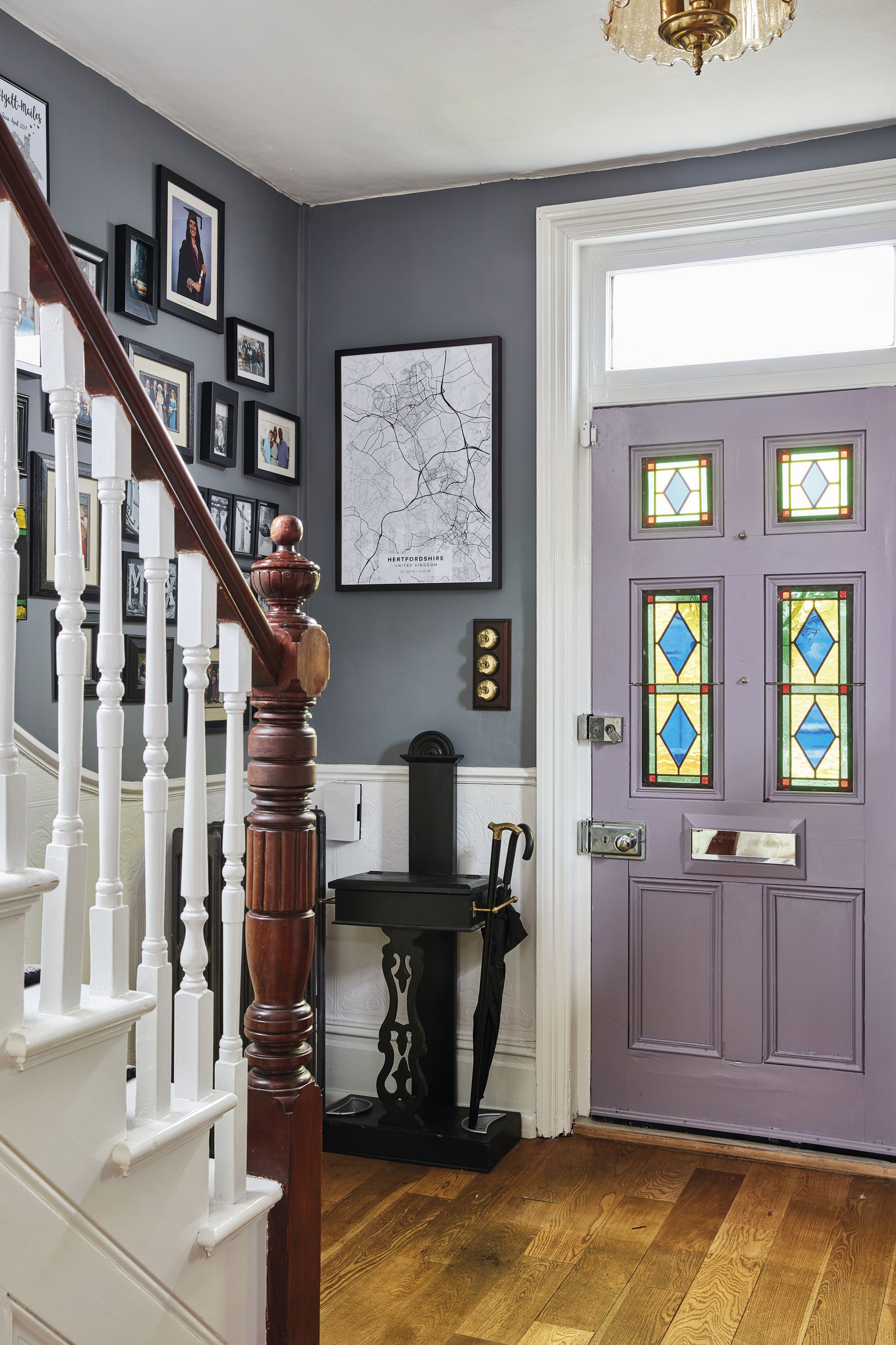 Why not copy Sharon’s idea and paint your wooden front door in a fresh colour? She used Dusty Lilac eggshell by Valspar. On the wall hangs an old map of Hertfordshire by Mapiful. To finish off her hallway, Sharon has installed period-style switches that she sourced from eBay. The umbrella stand is a marketplace find Why not copy Sharon’s idea and paint your wooden front door in a fresh colour? She used Dusty Lilac eggshell by Valspar. On the wall hangs an old map of Hertfordshire by Mapiful. To finish off her hallway, Sharon has installed period-style switches that she sourced from eBay. The umbrella stand is a marketplace find