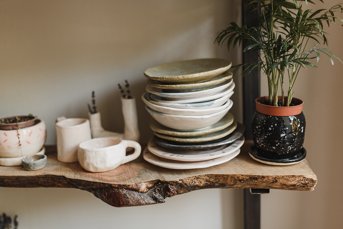 Ceramic dishes on a shelf