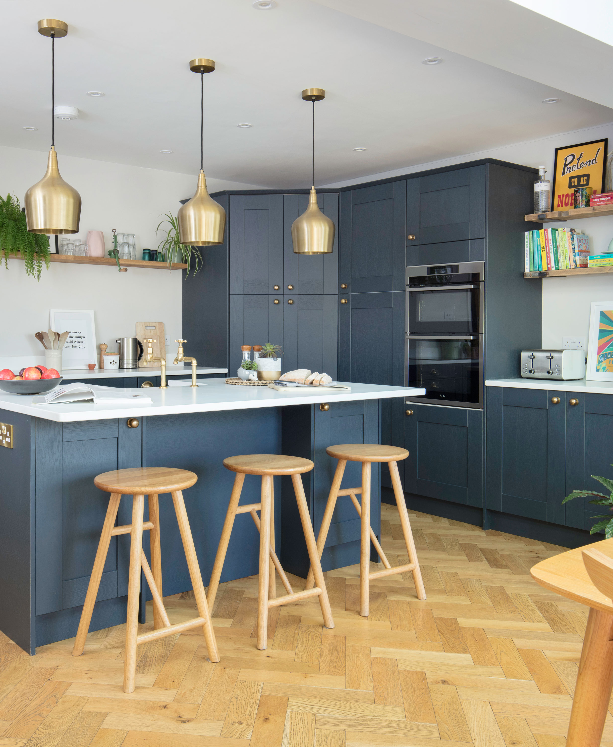 Good idea! Hang pendant lights over a central island to create a focal point and provide useful task lighting.