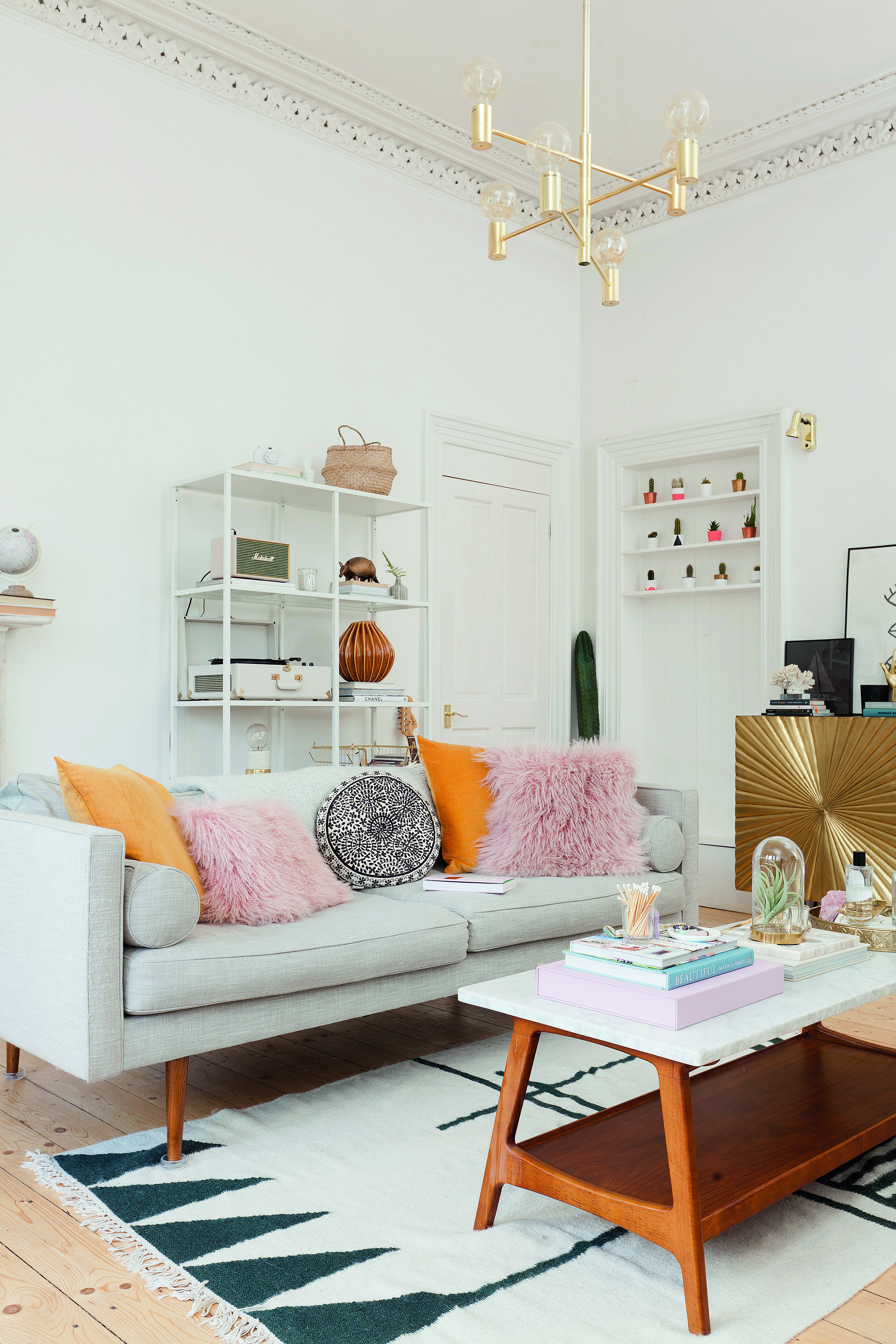 Home makeover: 'Our flat has bags of character!' Regularly changing accessories in the living room allows for a quick and easy refresh. ‘While I’m tempted to buy new pieces to give the space a new lease of life,’ says Kate, ‘I know that having a switch up does the job just as well’