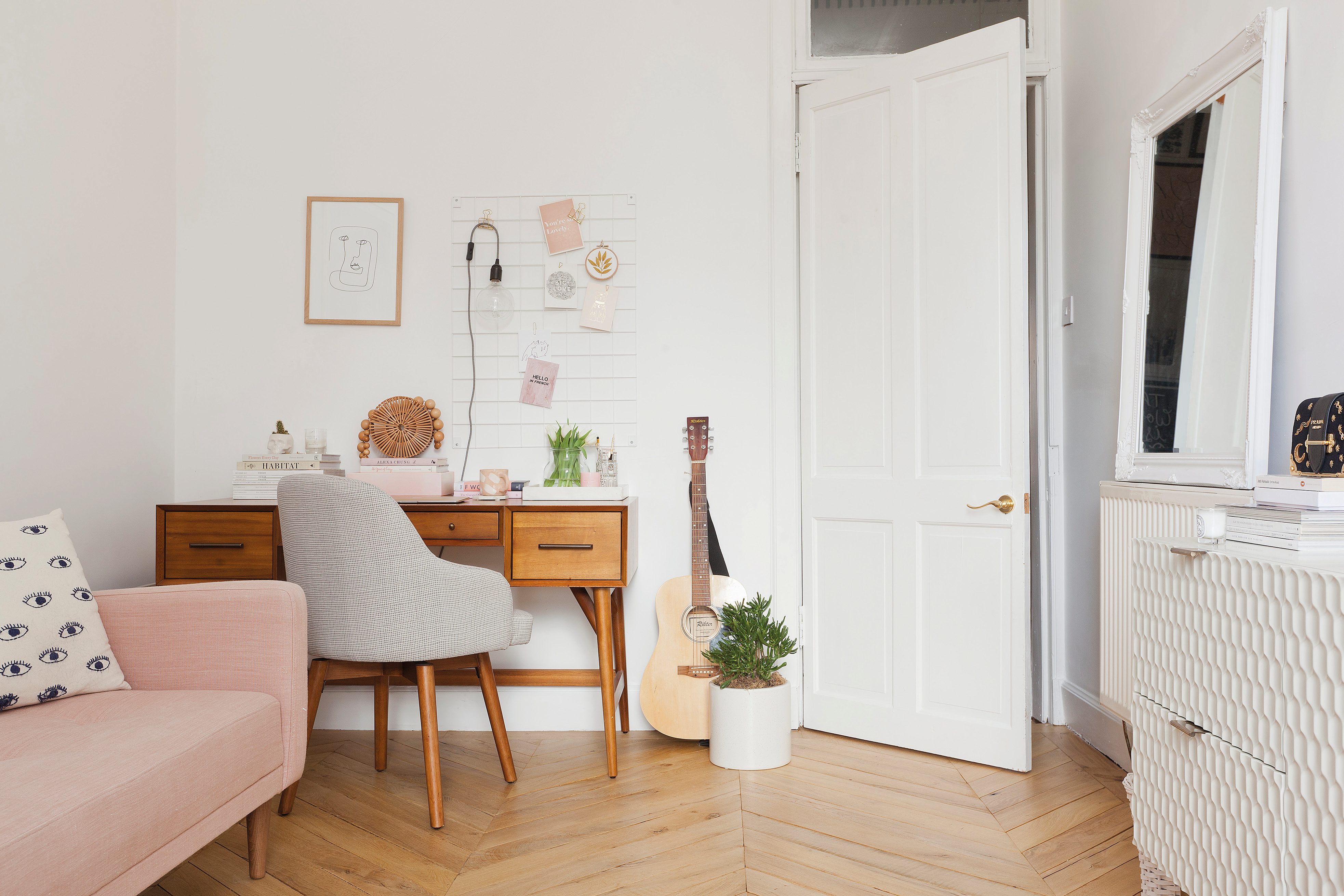 Home makeover: 'Our flat has bags of character!' Kate’s home office is a calm, mid- century-inspired space with vintage accents in the West Elm desk and Made.com sofa bed. The parquet-style flooring adds warmth to the room