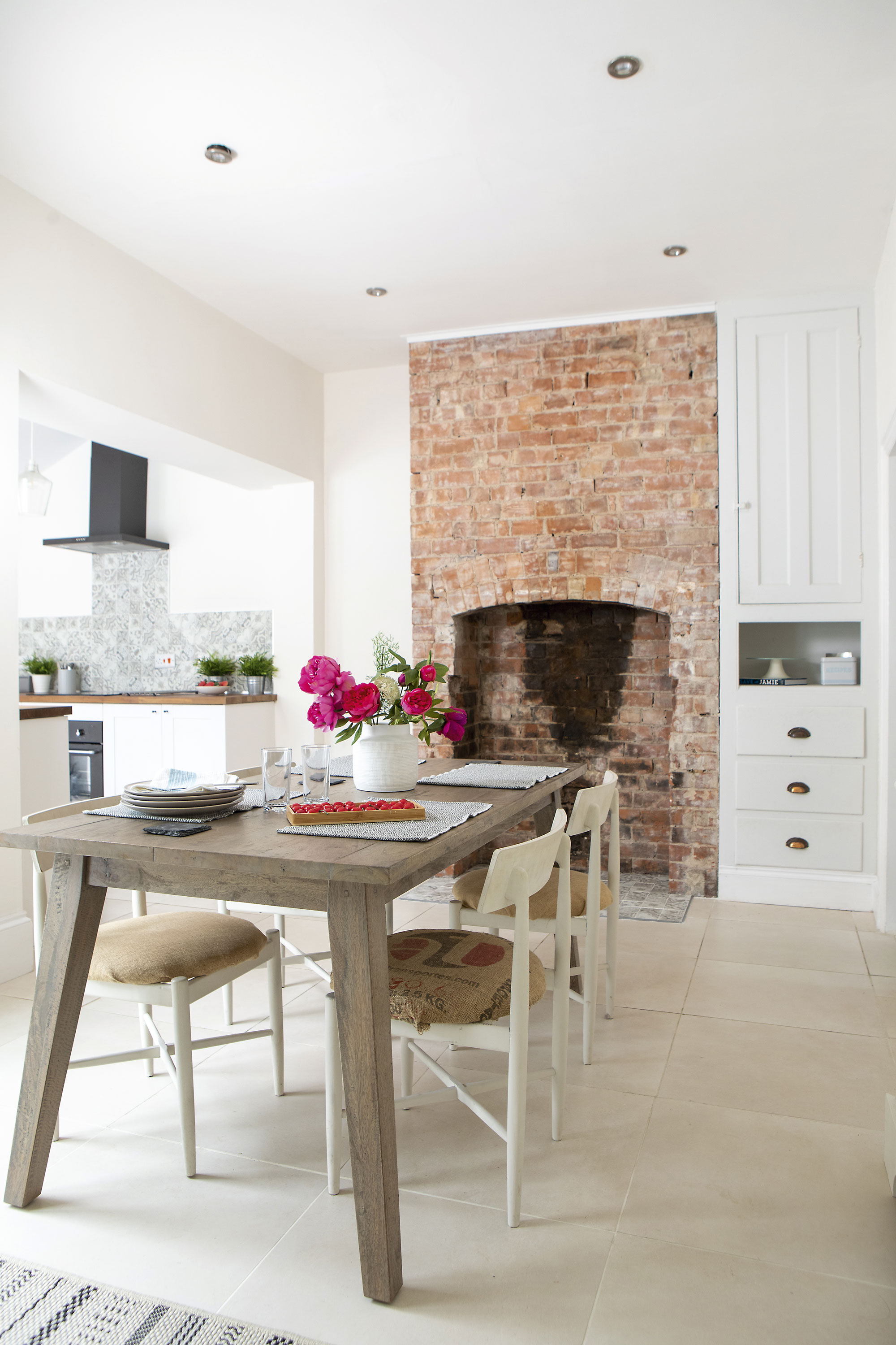 Kate picked up a sledgehammer to remove the old plaster from the fireplace and expose the stunning original brickwork underneath