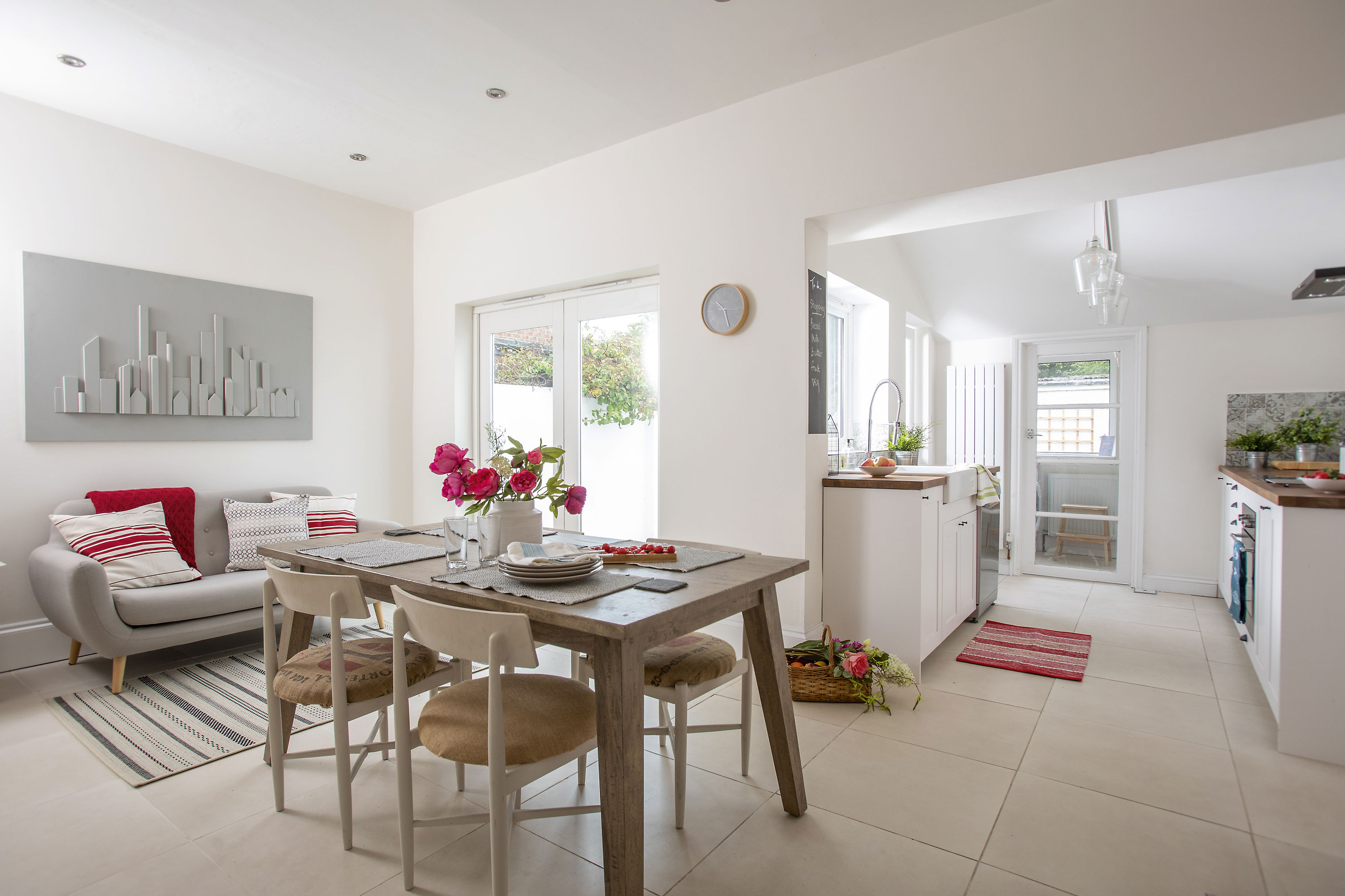 While taking out walls to create one large space, Kate also took down the old low ceiling to make the kitchen feel light and open Kitchen makeover: 'The kitchen is now the best room in the house'