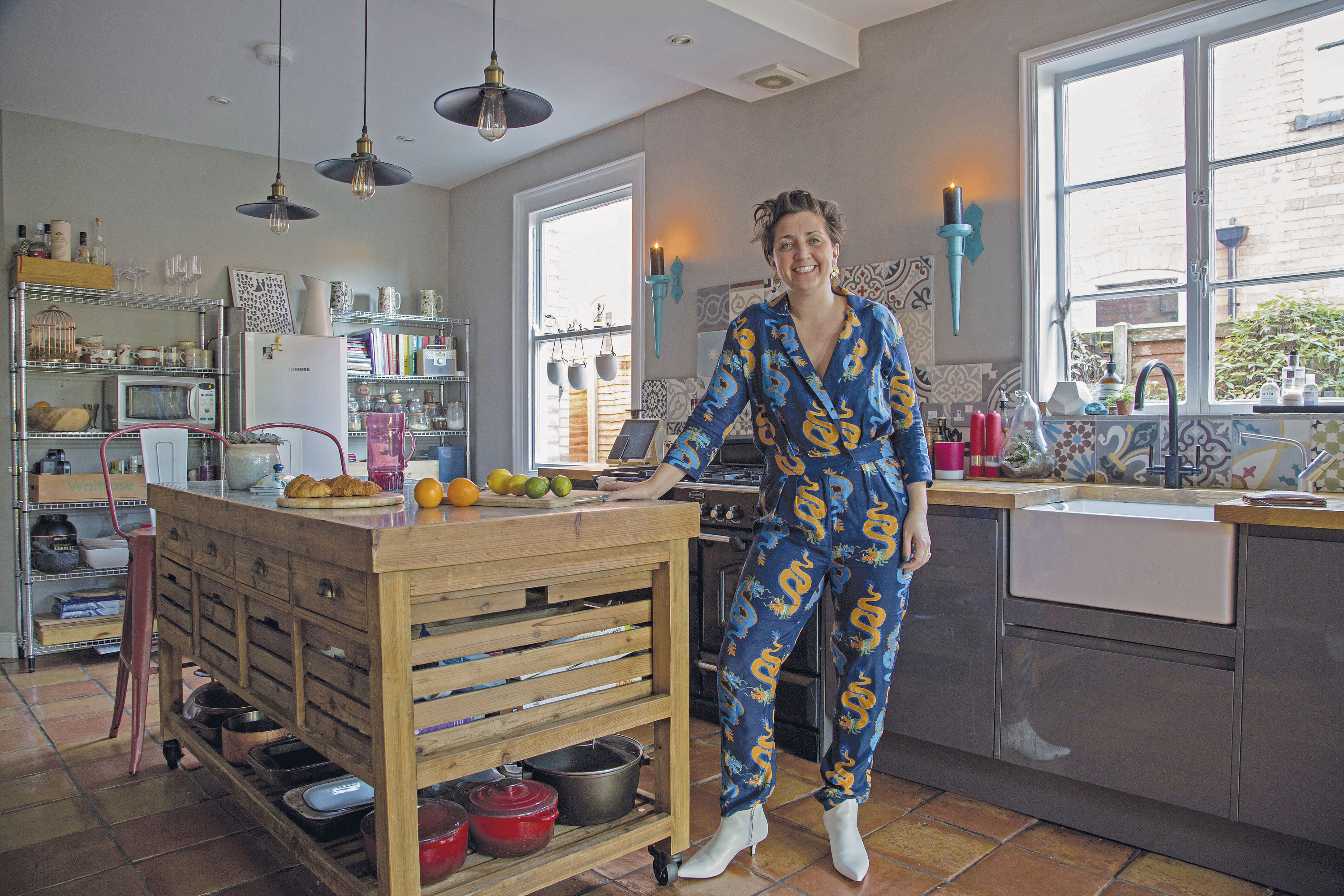 Previously compact and enclosed, Megan knocked through the dining room wall and added a rear extension to create a large, open-plan kitchen-diner that has since become the heart of her home. ‘The kitchen island is on wheels, which makes it especially handy for when we’re entertaining, which I like to do frequently,’ says Megan