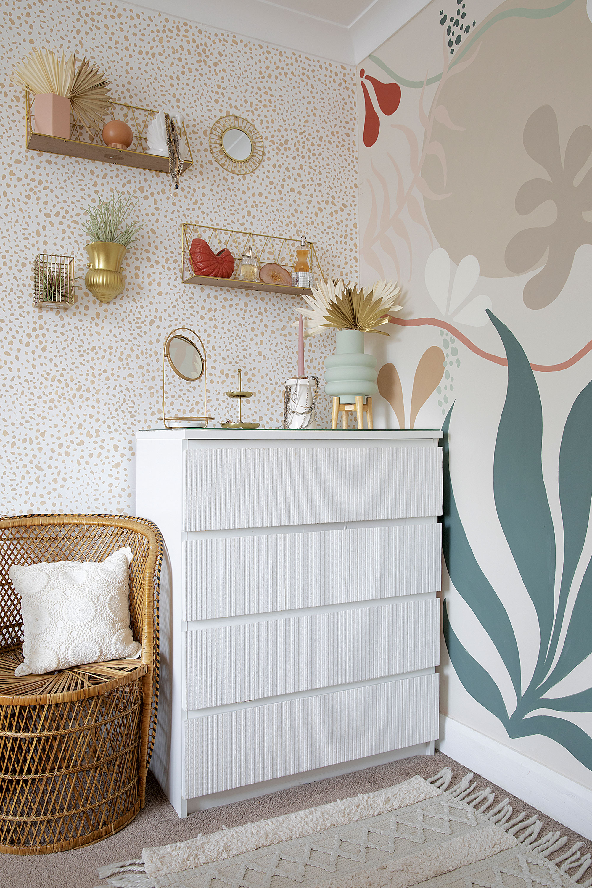 Some clever upcycling has given these scratched drawers a new lease of life. ‘I considered wooden dowels on the front, but it would’ve been time-consuming to do, so I used wallpaper instead to give a similar effect.’ The gold shelves are from B&M Some clever upcycling has given these scratched drawers a new lease of life. ‘I considered wooden dowels on the front, but it would’ve been time-consuming to do, so I used wallpaper instead to give a similar effect.’ The gold shelves are from B&M