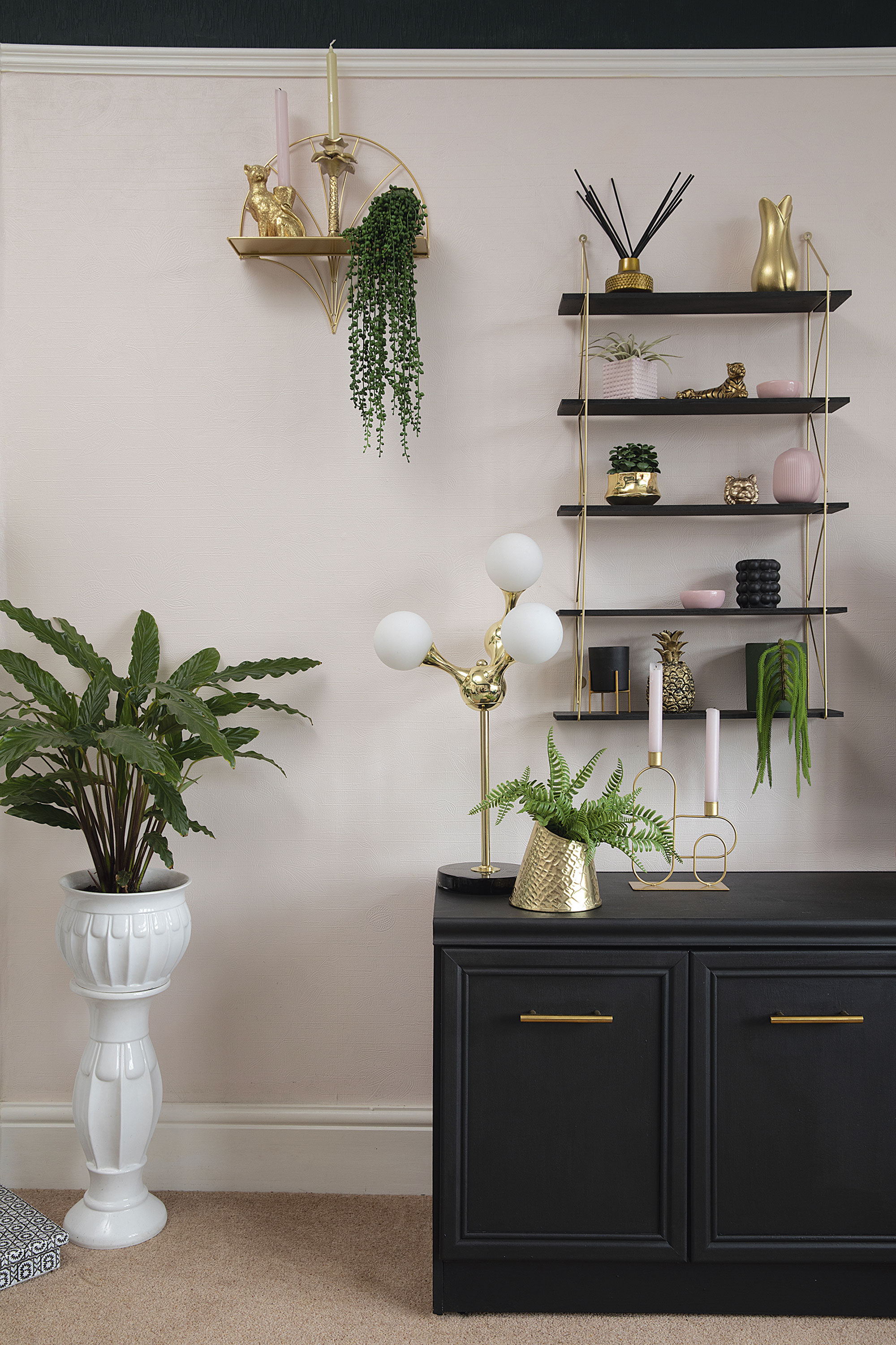 A £40 sideboard from a charity shop has been painted in Blackjack chalk paint by Frenchic, with shelving from B&M above. ‘I liked the 70s style, but it didn’t fit with everything else in the room,’ says Leanne. ‘The gold handles were £8 on eBay and really finish it off’ A £40 sideboard from a charity shop has been painted in Blackjack chalk paint by Frenchic, with shelving from B&M above. ‘I liked the 70s style, but it didn’t fit with everything else in the room,’ says Leanne. ‘The gold handles were £8 on eBay and really finish it off’