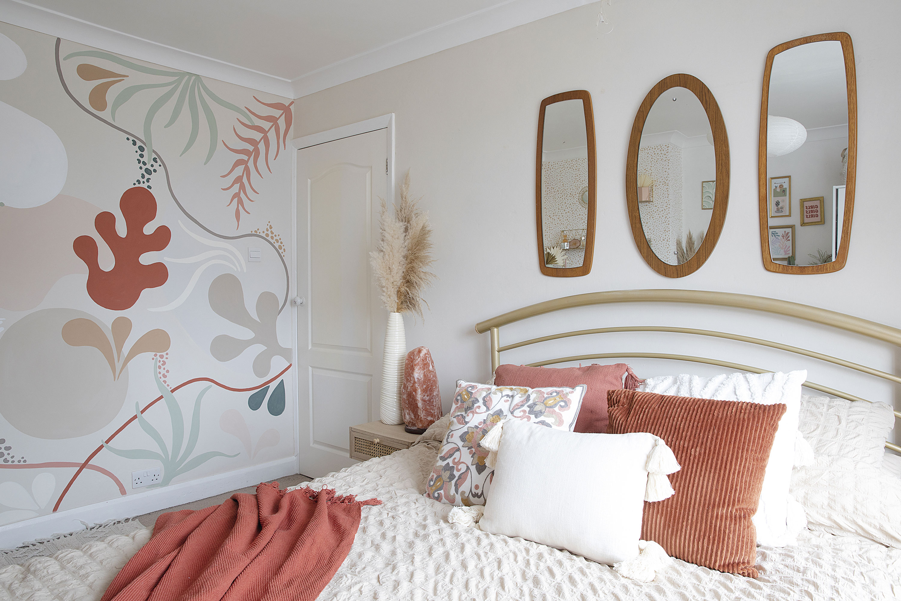 ‘I took my cue for the soft furnishings from the autumnal colours of the wall mural,’ says Leanne. ‘I wanted to bring some warmer tones into what was a very neutral colour palette without going too bold’ ‘I took my cue for the soft furnishings from the autumnal colours of the wall mural,’ says Leanne. ‘I wanted to bring some warmer tones into what was a very neutral colour palette without going too bold’