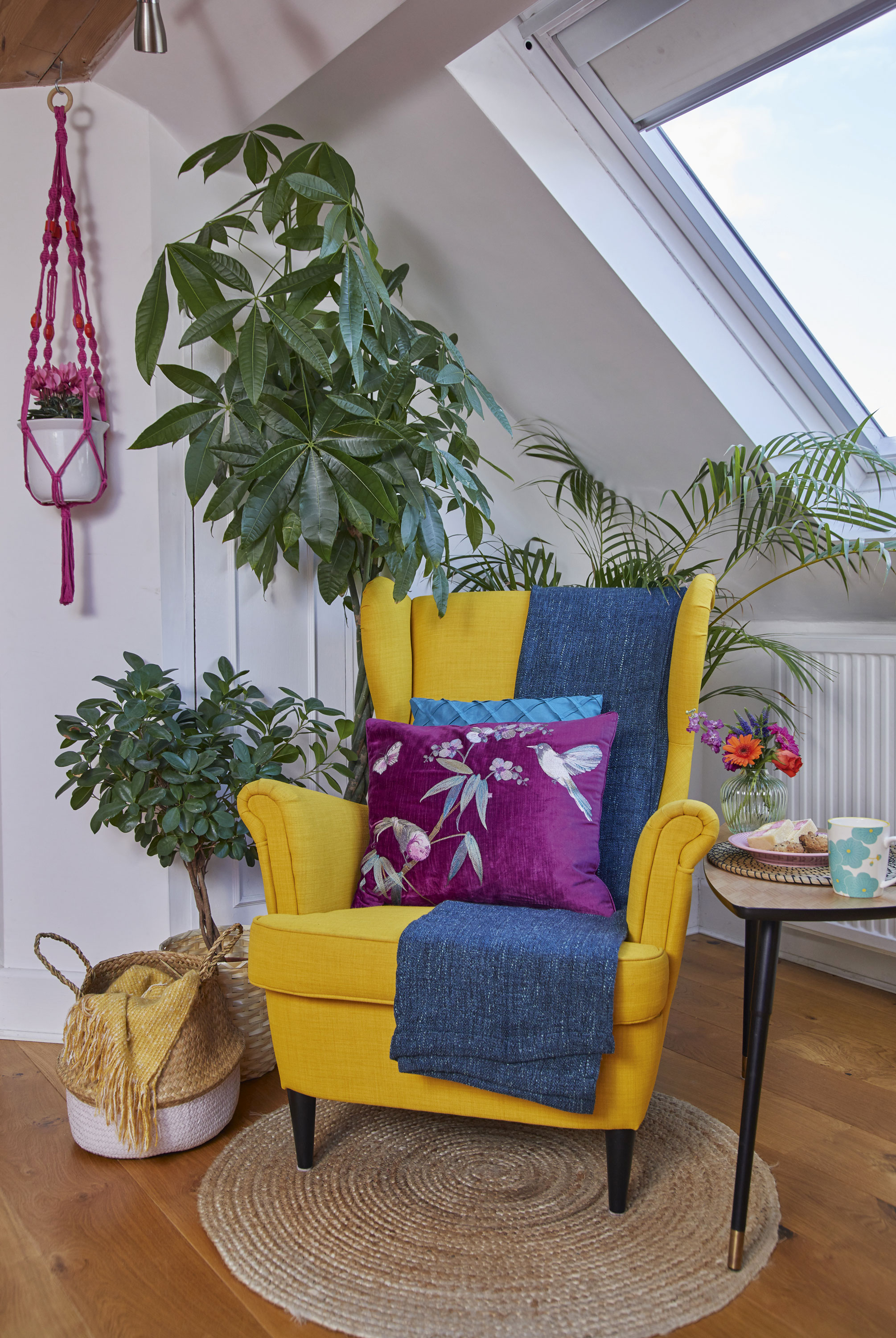 The bright colour and retro feel of this IKEA chair ticks both of Emma’s main interior styling loves, and the side table, found for £10 in IKEA’s Bargain Corner, is one of her many purse-friendly finds Living room makeover: 'My multi-use room sings with colour'