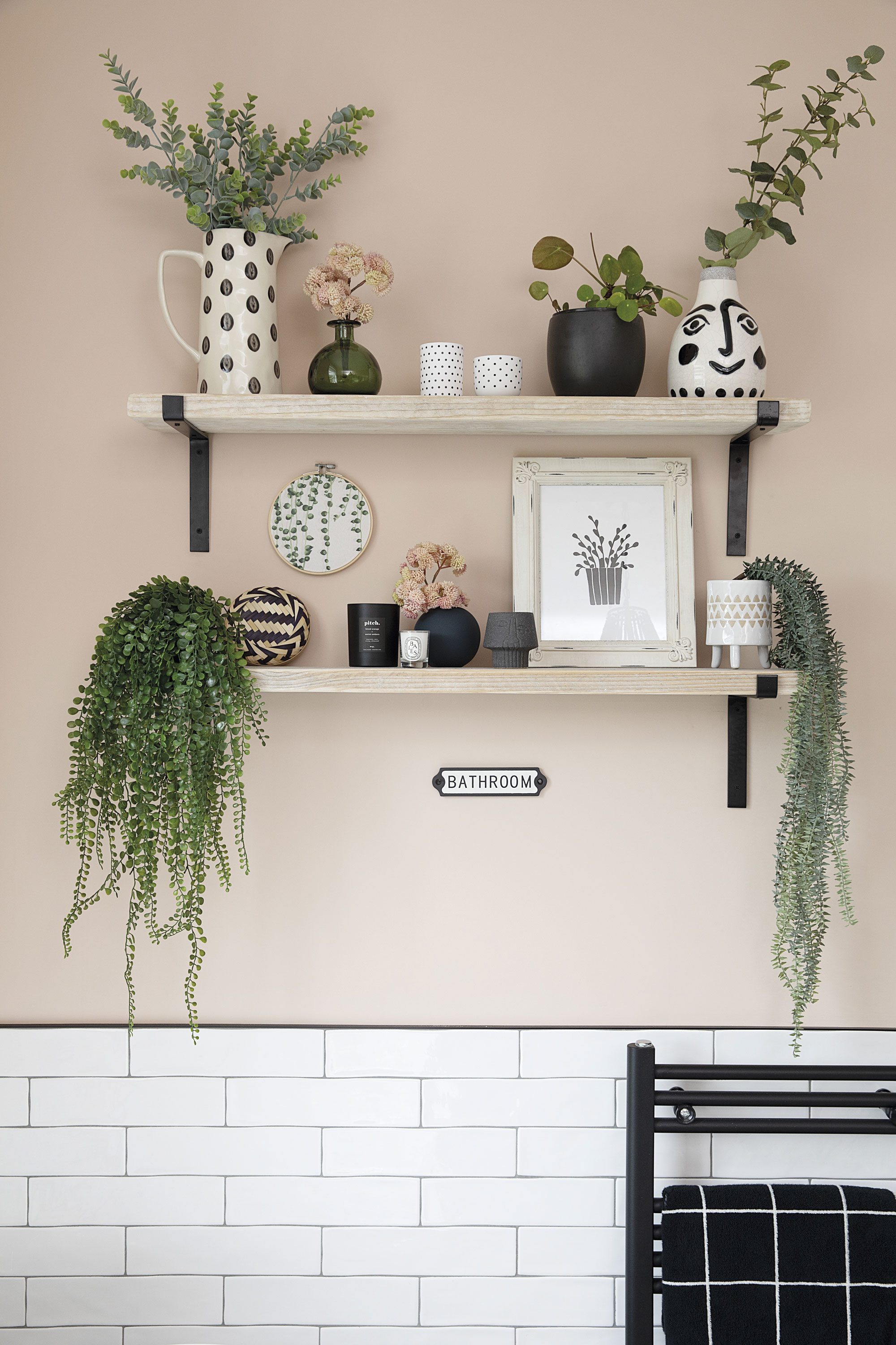 Stylist Liz loves spending time rearranging her shelves with different vases, plants and prints to keep the scheme looking fresh