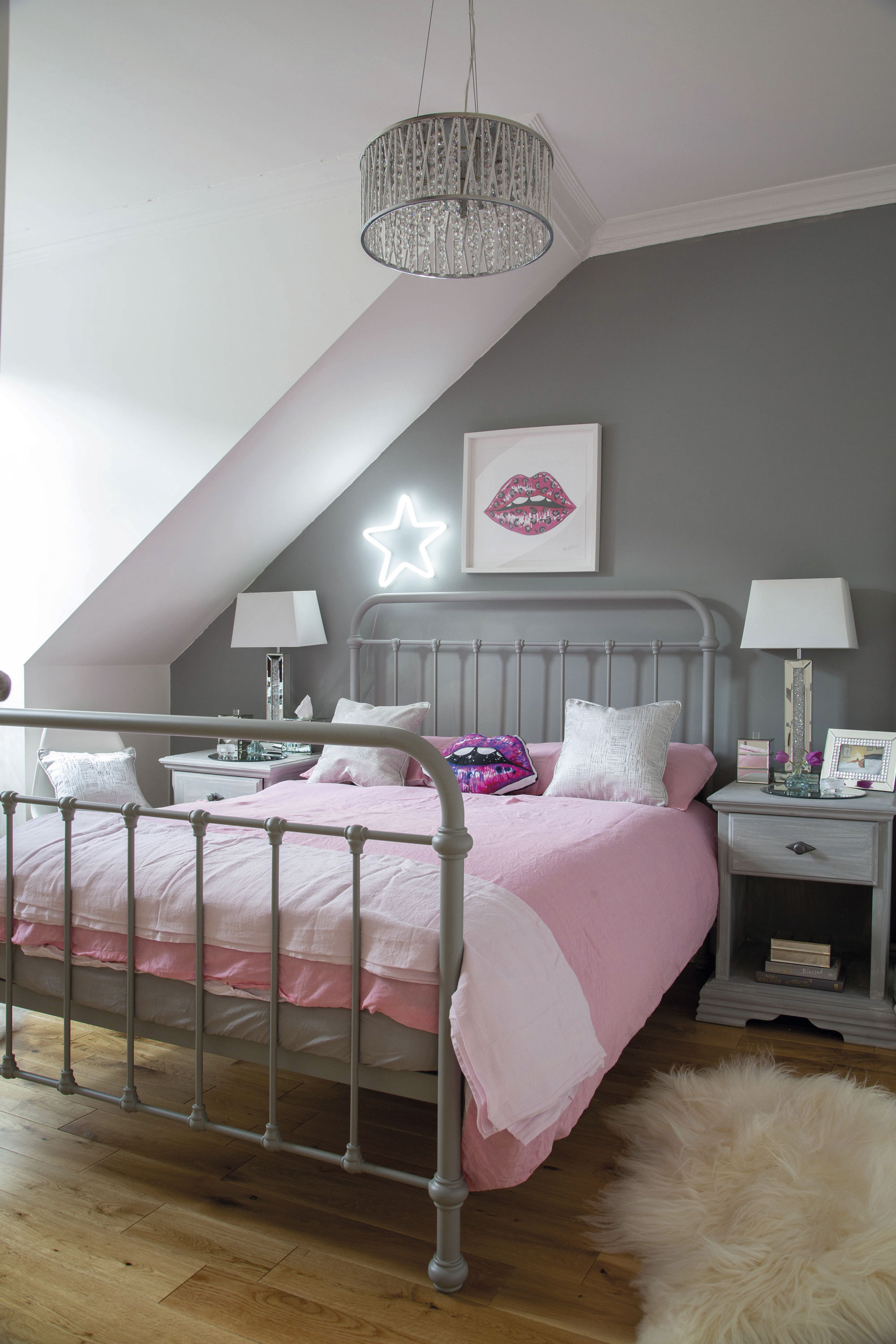 ‘The bed frame is from Feather & Black and I bought the bedside cabinets from a local charity shop before painting them the same shade as the wall,’ Lesley says ‘The bed frame is from Feather & Black and I bought the bedside cabinets from a local charity shop before painting them the same shade as the wall,’ Lesley says