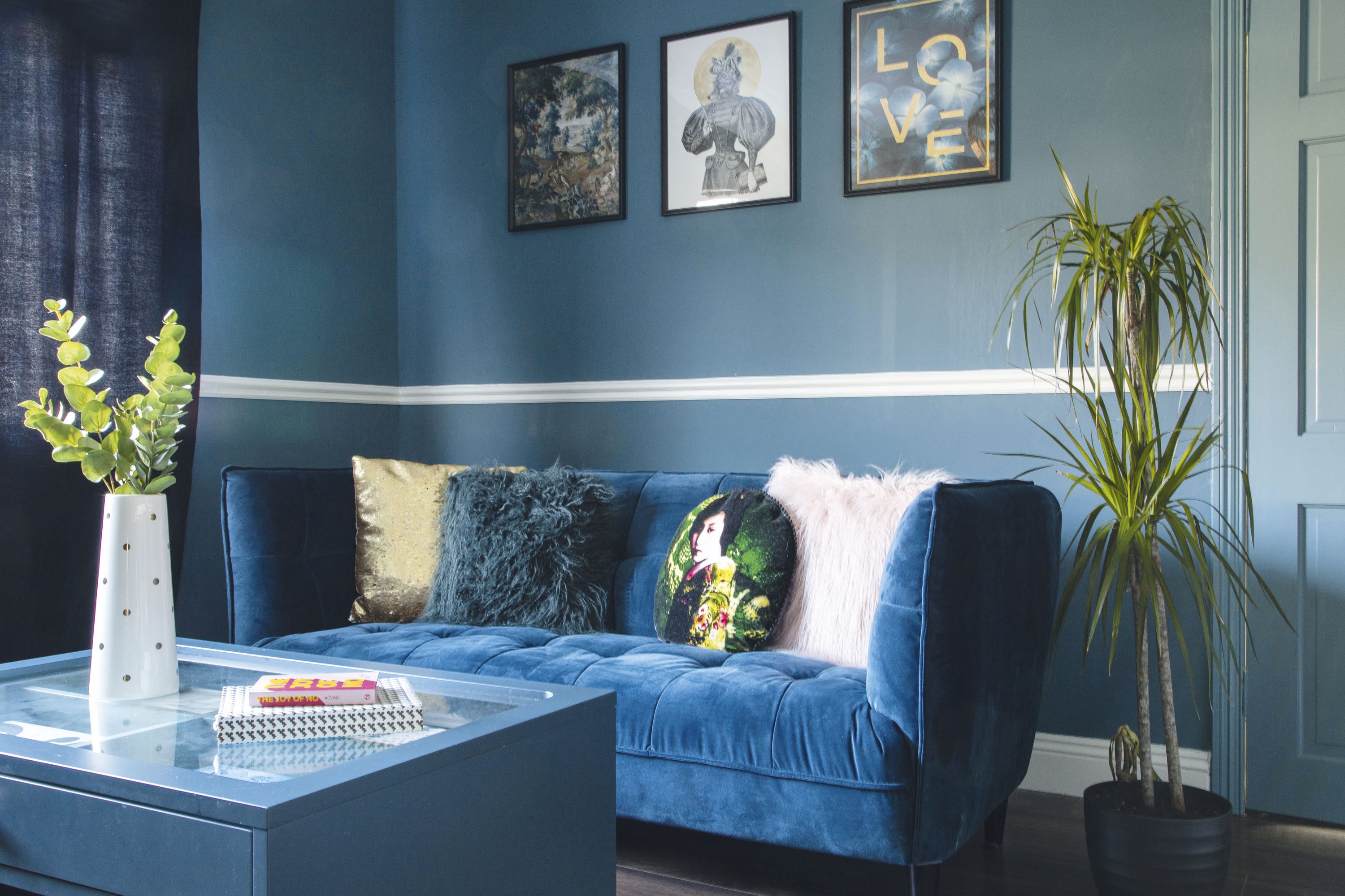 To create a calm and cosy ambiance, Lynn opted for a deep teal hue for the sitting room walls. Teamed with the velvet sofa and metallic trim, it gives the space that glam, boutique hotel look she had aspired for To create a calm and cosy ambiance, Lynn opted for a deep teal hue for the sitting room walls. Teamed with the velvet sofa and metallic trim, it gives the space that glam, boutique hotel look she had aspired for