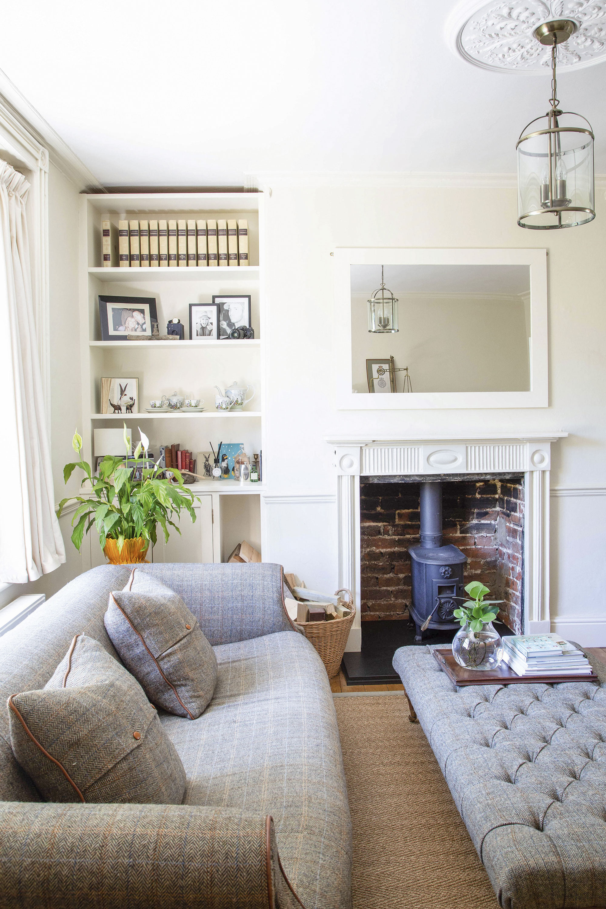Real home: 'It was a bigger project than we ever imagined' Vicky lightened the room with Farrow & Ball’s Lime White and White Tie, which draws the eye to the alcove treasures. The tweed sofas were from Jarrold, a Norwich-based department store, and add a traditional feel