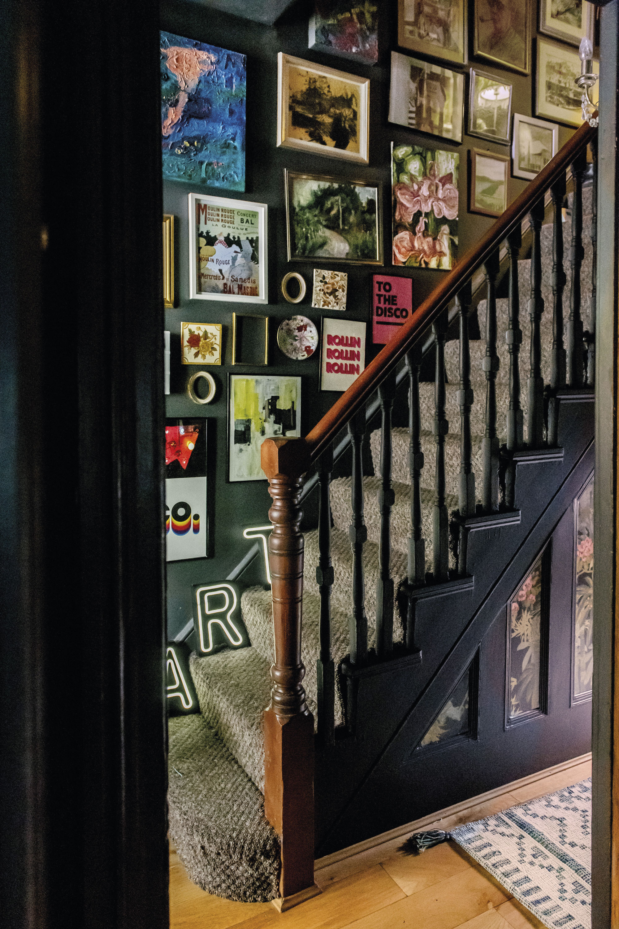 ‘I want people to feel excited when they walk into my house, so I painted the hallway dark grey and, more recently, papered the lower half of the wall in Linwood’s Bamboo Garden,’ says Lily. ‘I also painted the inside of the front door pink using Frenchic Paint.’ ‘I want people to feel excited when they walk into my house, so I painted the hallway dark grey and, more recently, papered the lower half of the wall in Linwood’s Bamboo Garden,’ says Lily. ‘I also painted the inside of the front door pink using Frenchic Paint.’