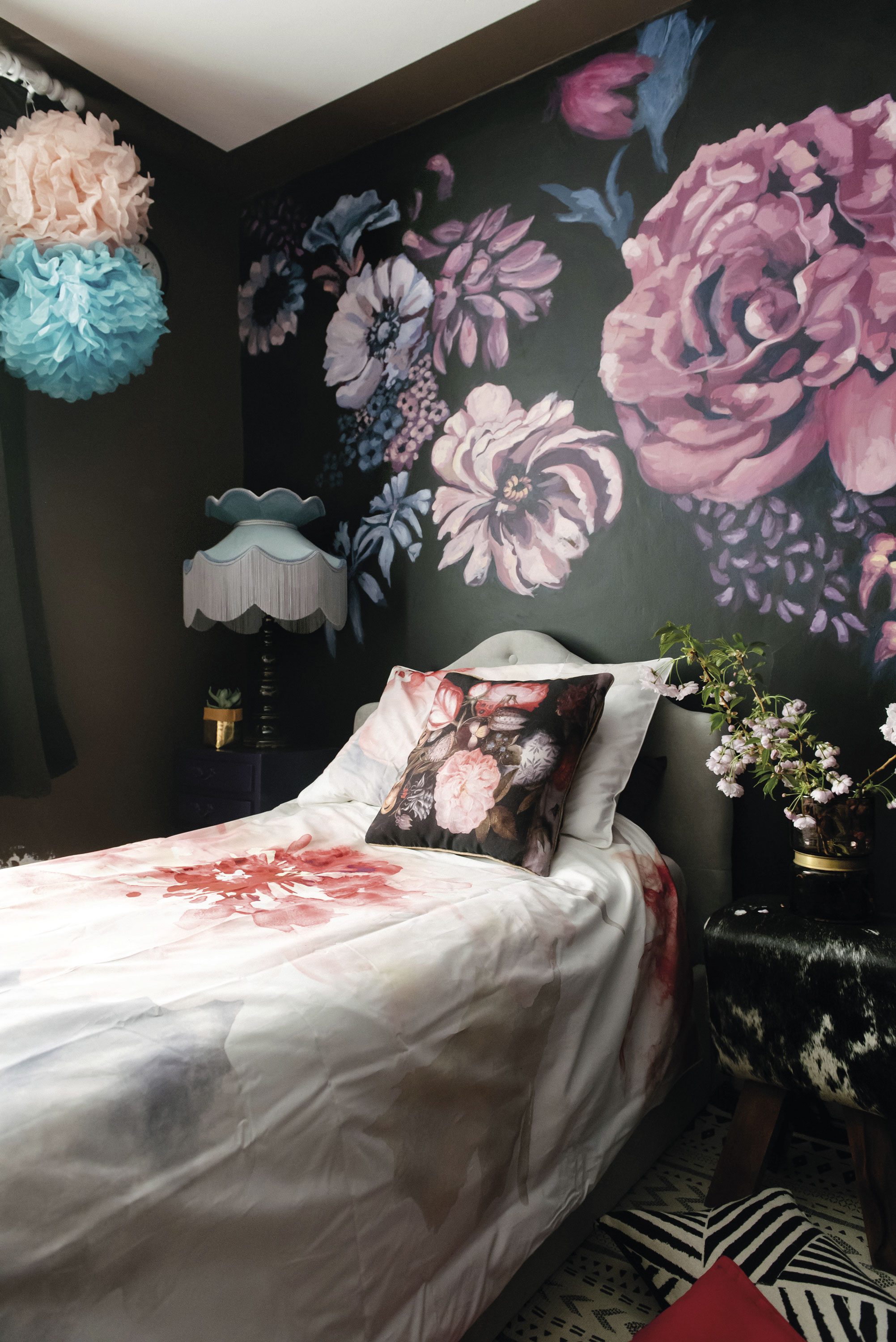 ‘I painted the mural using Frenchic paint,’ says Lily. ‘This room gets lots of sunlight, so I wanted it to have a nostalgic holiday feel with florals and blush pink tones.’