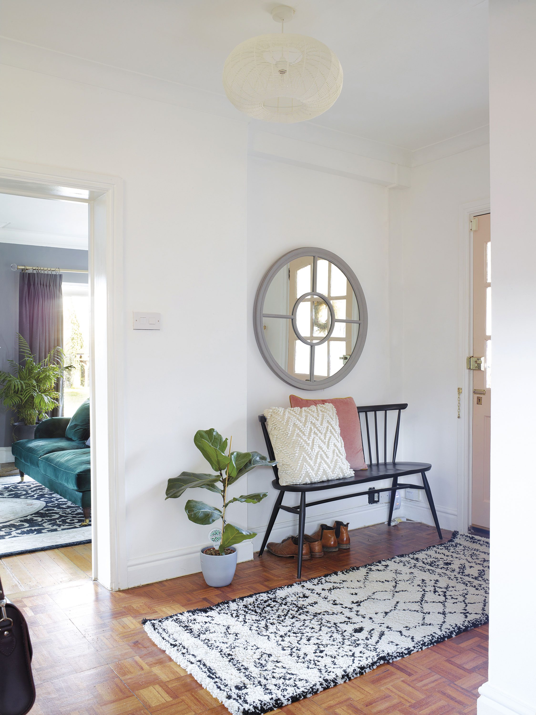 Hayley’s entranceway sets the tone for the house. With its simple bench and mirror, it feels calm and welcoming Hayley’s entranceway sets the tone for the house. With its simple bench and mirror, it feels calm and welcoming
