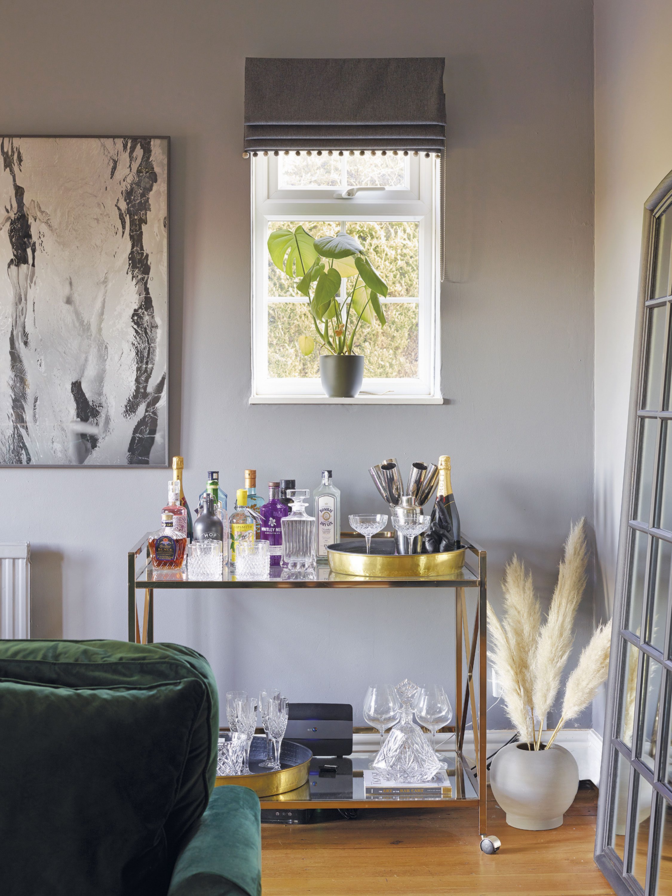 ‘To me a cocktail cabinet has a real sense of nostalgia,’ says Hayley. ‘There’s something so glamorous about a drink before dinner and I had romanticised the idea for ages,’ says Hayley. ‘Eventually I found this cabinet at a second-hand store for £100. The crystal pieces are on loan from Paul’s mum and dad’ ‘To me a cocktail cabinet has a real sense of nostalgia,’ says Hayley. ‘There’s something so glamorous about a drink before dinner and I had romanticised the idea for ages,’ says Hayley. ‘Eventually I found this cabinet at a second-hand store for £100. The crystal pieces are on loan from Paul’s mum and dad’