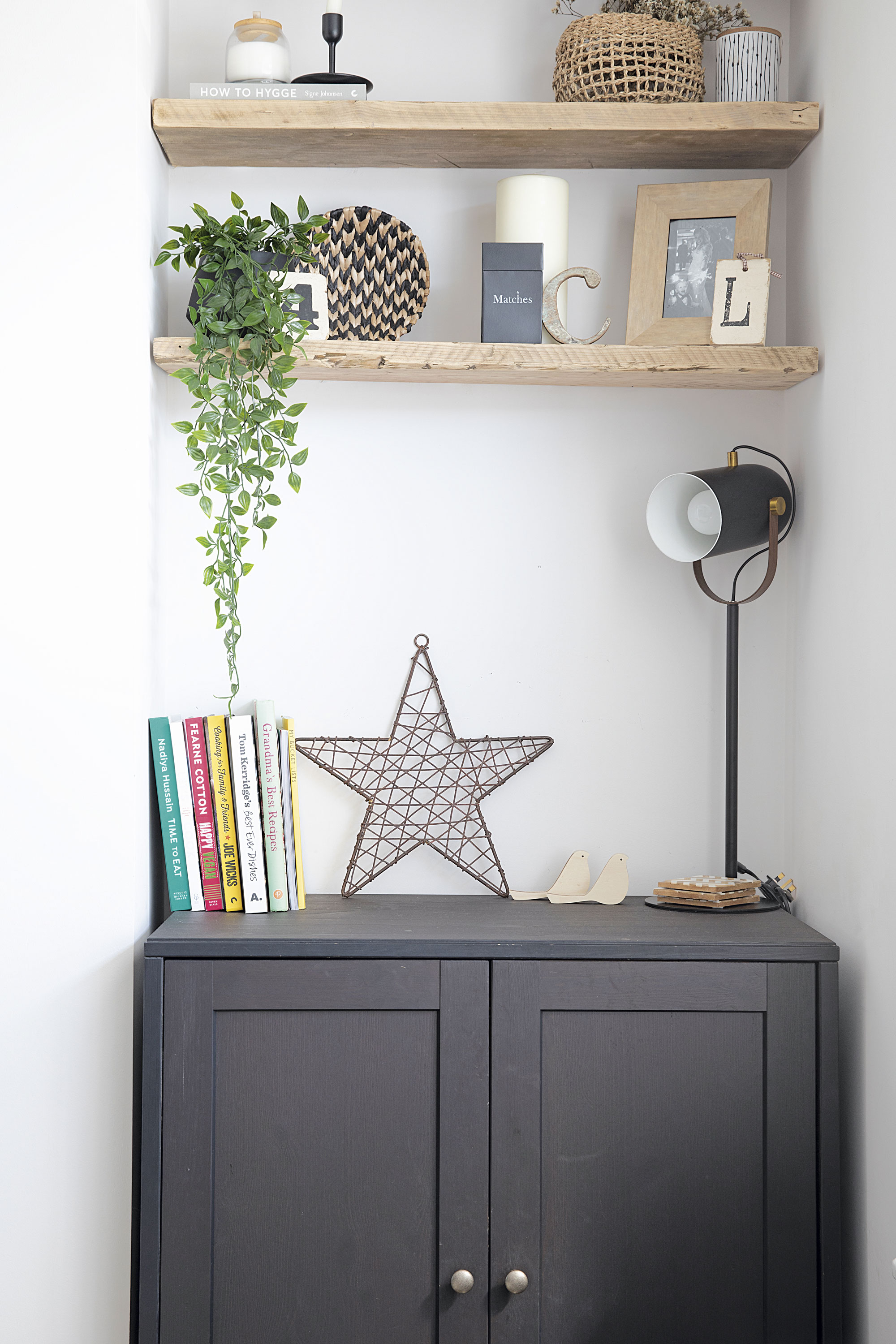 Scaffold board shelves attached with floating brackets have made the most of the alcove space, which is finished off with wicker baskets from Next and Nkuku. ‘The IKEA unit was a lucky find as it fitted perfectly,’ says Laura, ‘and the lamp from Cult Furniture adds an industrial touch’ Scaffold board shelves attached with floating brackets have made the most of the alcove space, which is finished off with wicker baskets from Next and Nkuku. ‘The IKEA unit was a lucky find as it fitted perfectly,’ says Laura, ‘and the lamp from Cult Furniture adds an industrial touch’