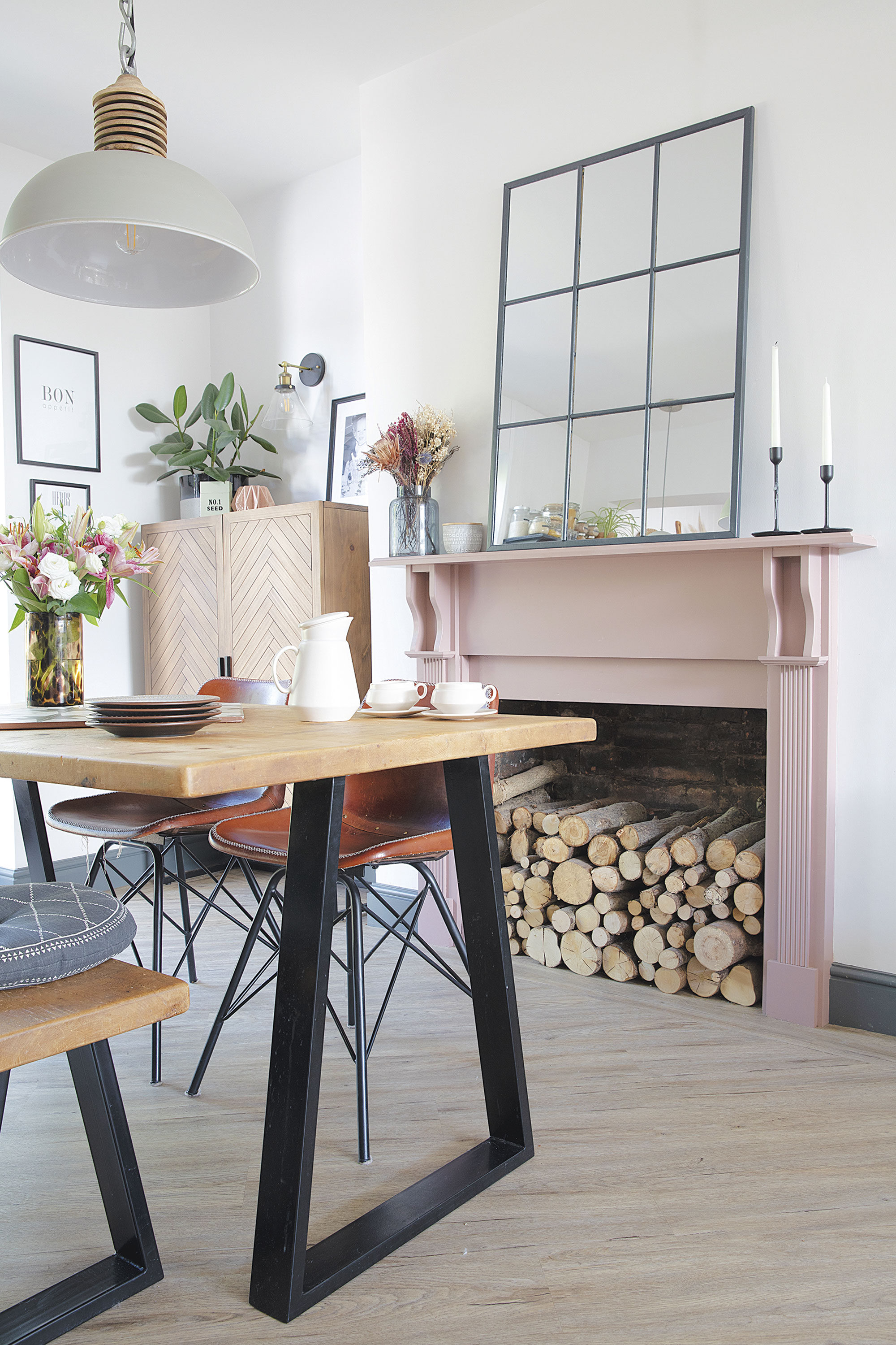 ‘The fireplace is the only thing we kept,’ says Laura. ‘I just love Sulking Room Pink by Farrow & Ball and when I painted it, it brought the whole room to life. The herringbone cabinet from La Redoute in the alcove is great for storing papers and toys too’ ‘The fireplace is the only thing we kept,’ says Laura. ‘I just love Sulking Room Pink by Farrow & Ball and when I painted it, it brought the whole room to life. The herringbone cabinet from La Redoute in the alcove is great for storing papers and toys too’