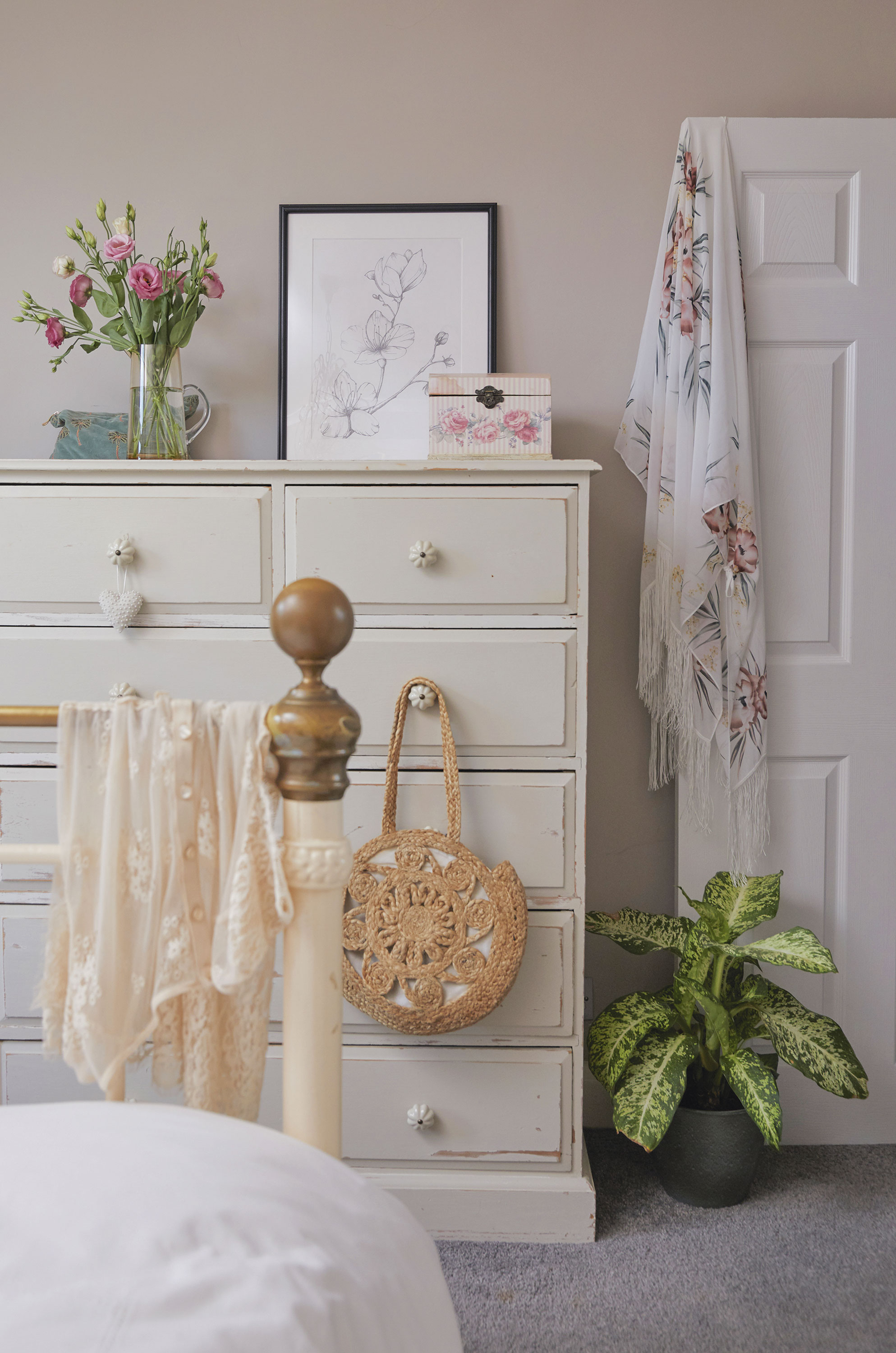 ‘These drawers were handmade locally and are a quality piece of furniture that will last. The flowers drawing is one of my own that I’ve framed’