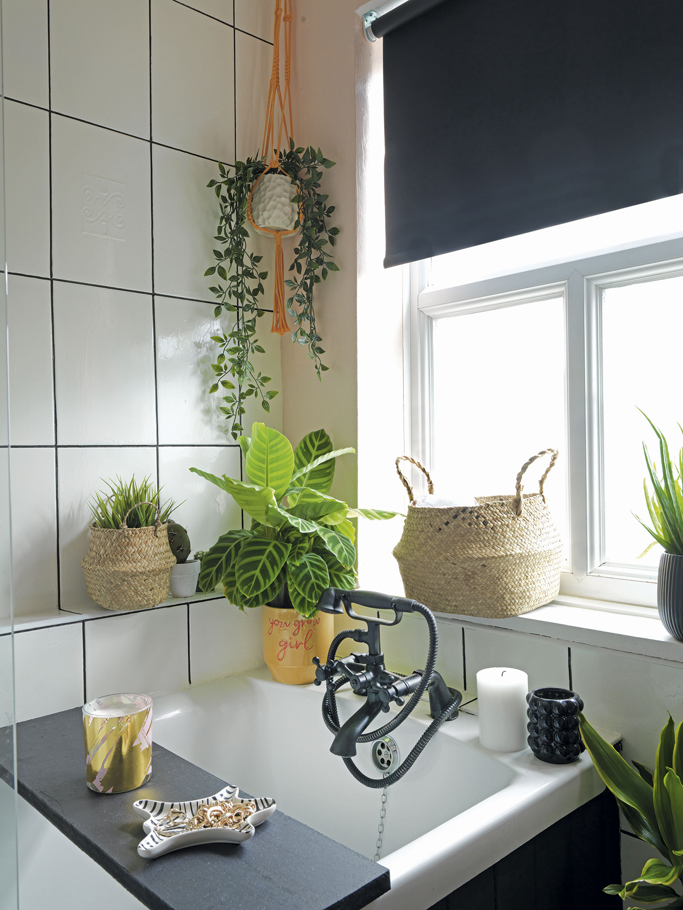 'Our home is cool & quirky with a bit of edge' Handy ledge space around the bath provides a place for plants or to keep toiletries within arm’s reach
