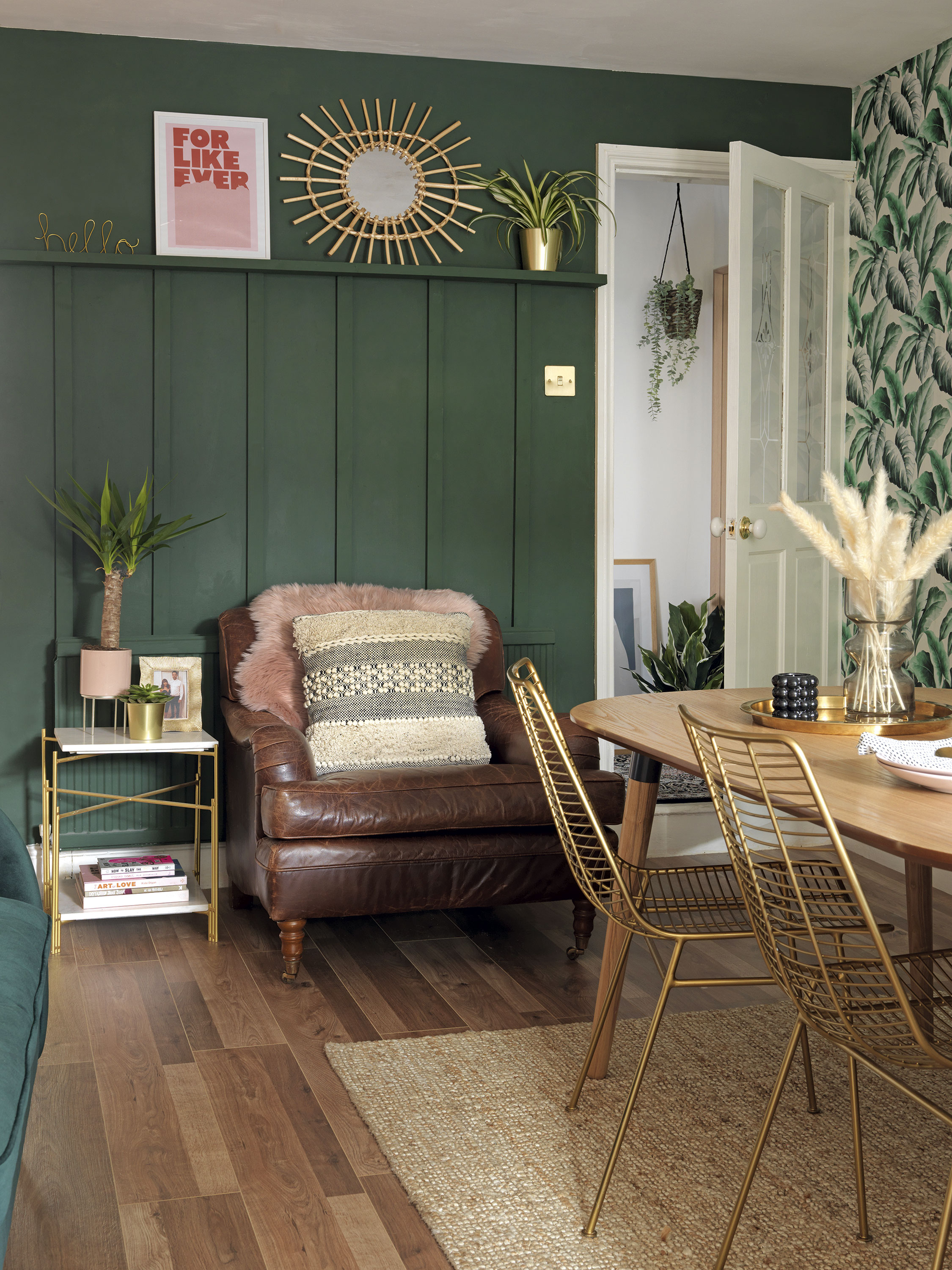 'Our home is cool & quirky with a bit of edge' A vintage leather armchair sits next to the couple’s best bargain buy – a real marble side table that they got for £3 in a charity shop. ‘It was originally a three-tier table,’ says Raya, ‘but one of the marble shelves was damaged. We took it out and it looks just as good, if not better, with the two shelves’