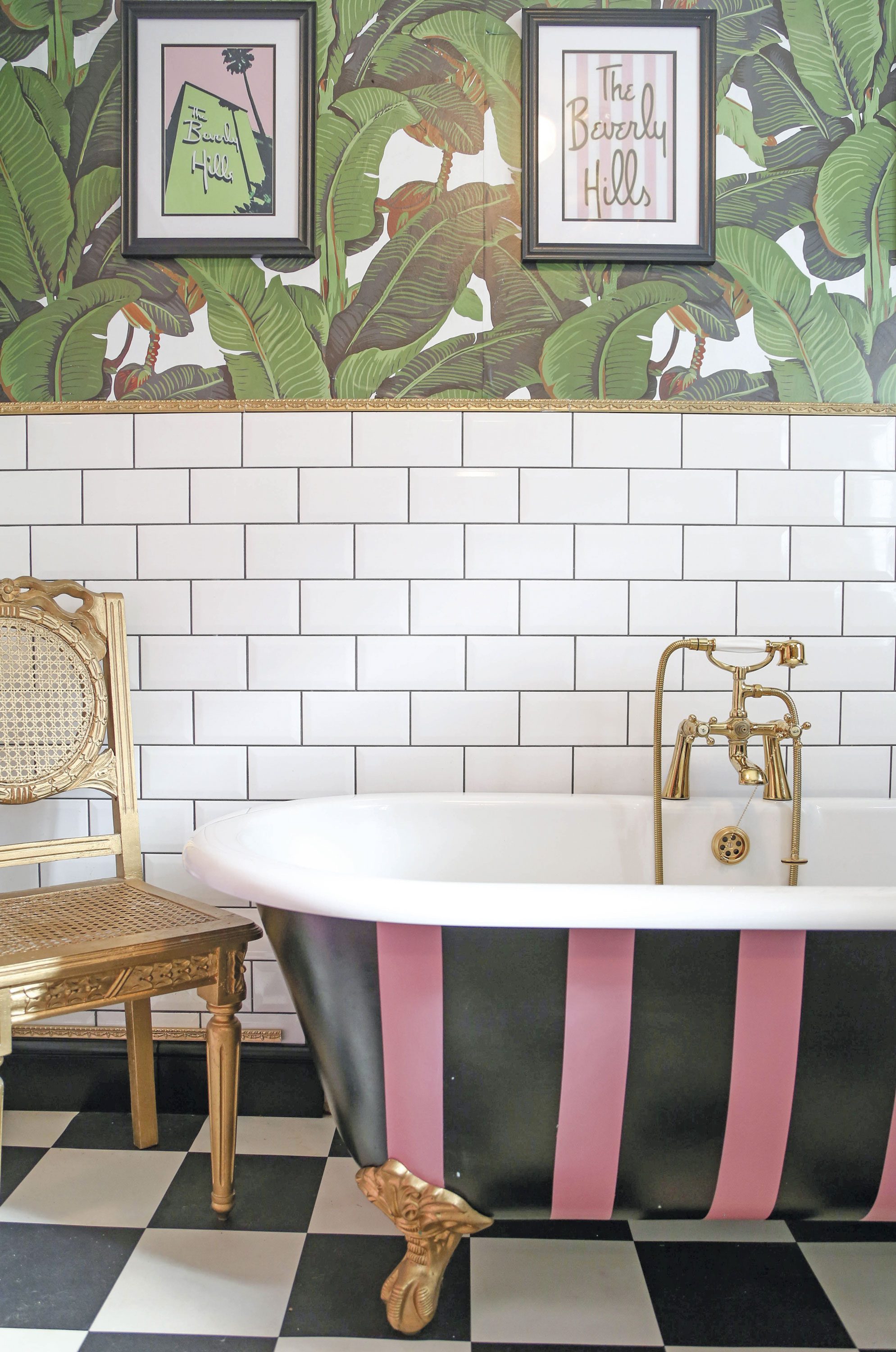 ‘I bought the bathroom suite from Bathstore,’ Hayley says. ‘Originally, the tub was white, but I decided to jazz it up using pink and black paints’ ‘I bought the bathroom suite from Bathstore,’ Hayley says. ‘Originally, the tub was white, but I decided to jazz it up using pink and black paints’