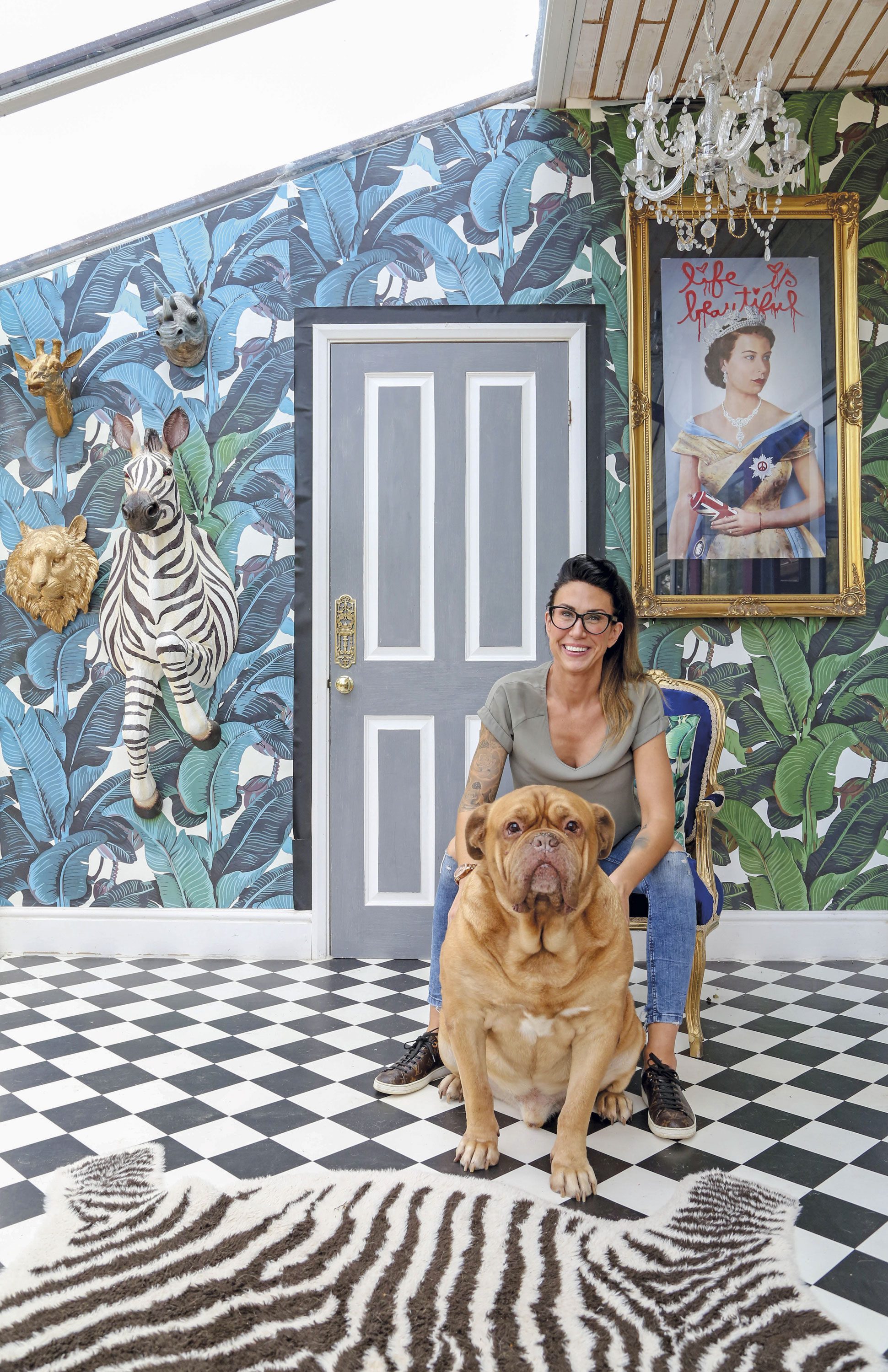 ‘The banana leaf wallpaper was bought from a seller on Etsy called Wallpapers 4 Beginners. The amazing print of the Queen is by Mr Brainwash. I framed it and gave it pride of place alongside my favourite piece: the zebra,’ Hayley says ‘The banana leaf wallpaper was bought from a seller on Etsy called Wallpapers 4 Beginners. The amazing print of the Queen is by Mr Brainwash. I framed it and gave it pride of place alongside my favourite piece: the zebra,’ Hayley says