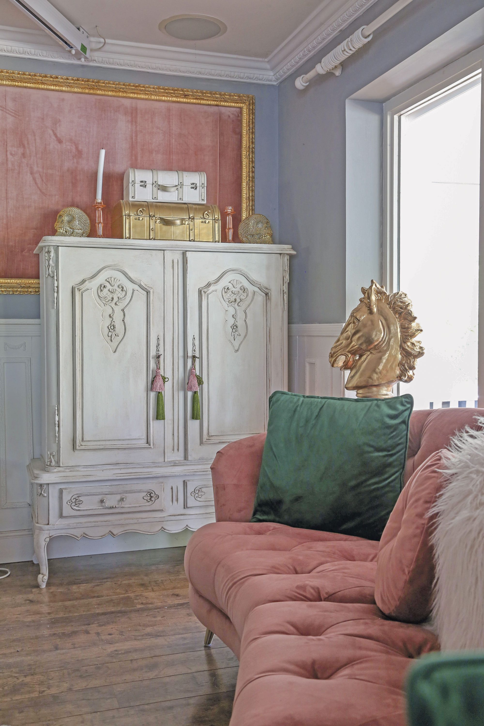 ‘I created my own wall art with huge, ornate gold frames and velvet fabric in the same shades as my sofas,’ Hayley says ‘I created my own wall art with huge, ornate gold frames and velvet fabric in the same shades as my sofas,’ Hayley says