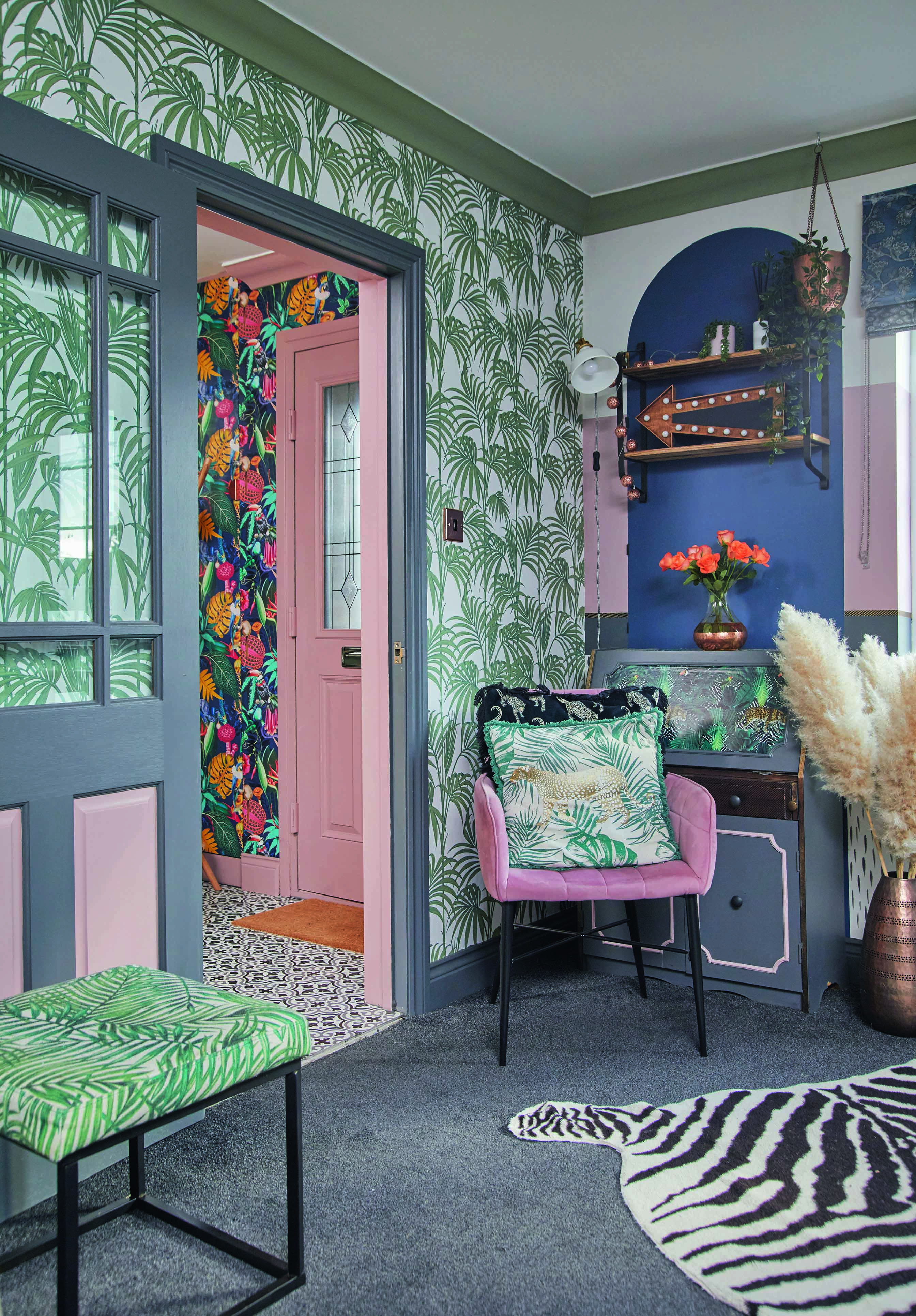 Emily's living room has an upcycled cabinet and a statement painted arch