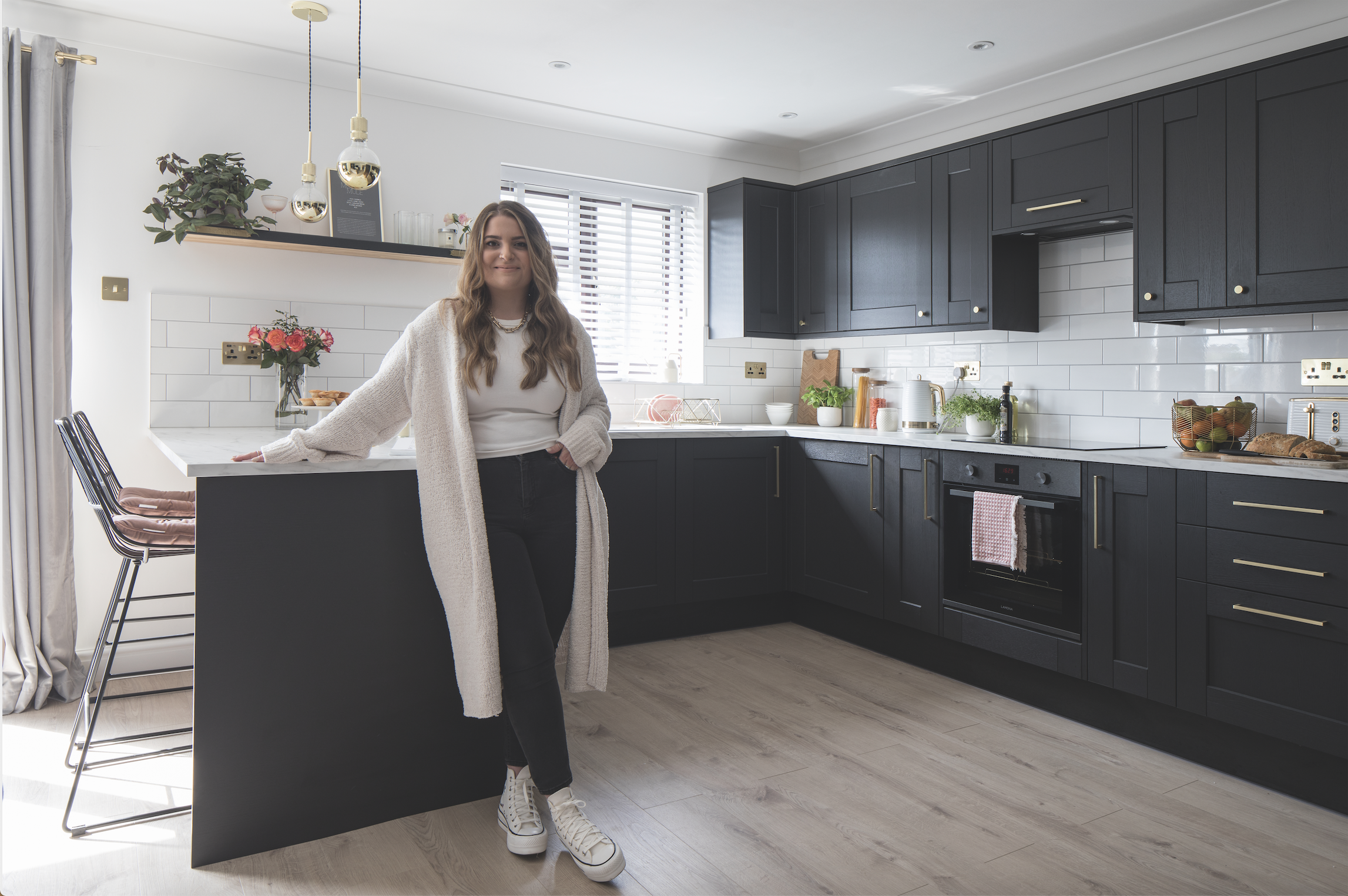Howden’s Fairford kitchen in Charcoal provided the basis for Becca’s soft-chic scheme. ‘The colour is almost black, which we find relaxing and cosy, whereas a white kitchen would have looked too clinical and bright,’ says Becca Howden’s Fairford kitchen in Charcoal provided the basis for Becca’s soft-chic scheme. ‘The colour is almost black, which we find relaxing and cosy, whereas a white kitchen would have looked too clinical and bright,’ says Becca