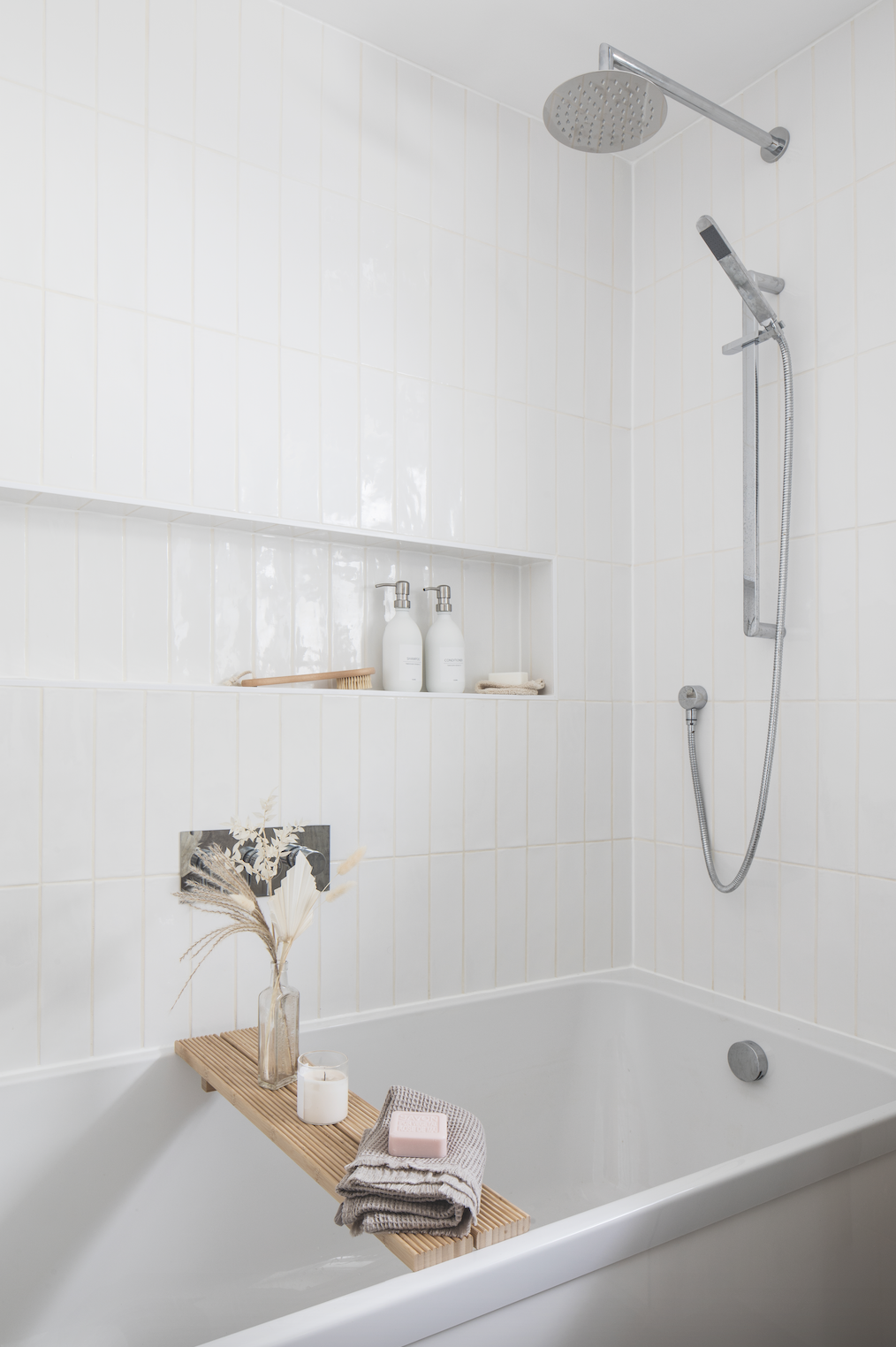 Laying Porcelain Superstore’s glossy white metro tiles vertically, and white marble-effect tiles on the floor, makes the space feel bigger. ‘They’re well-priced and good quality, with enough detail on them so the room doesn’t look flat,’ says Becca Laying Porcelain Superstore’s glossy white metro tiles vertically, and white marble-effect tiles on the floor, makes the space feel bigger. ‘They’re well-priced and good quality, with enough detail on them so the room doesn’t look flat,’ says Becca