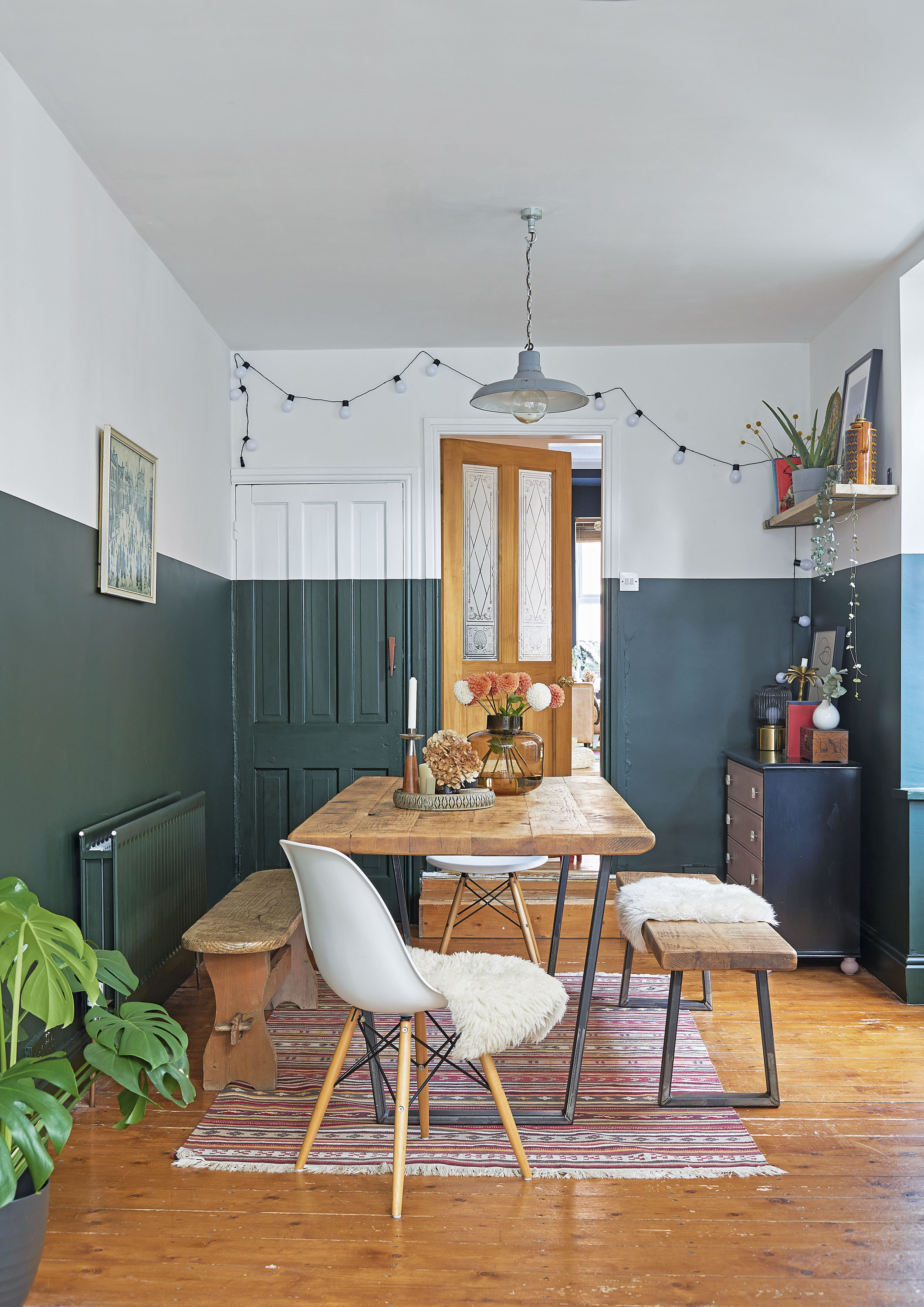The reclaimed wooden table and bench were made by a craftsperson on eBay, and Gemma has paired them with another bench that she bought in France. ‘We holiday there every year, and I love visiting the flea markets for vintage bargains,’ she says Kitchen makeover: 'We revamped our kitchen-diner for under £1,000'