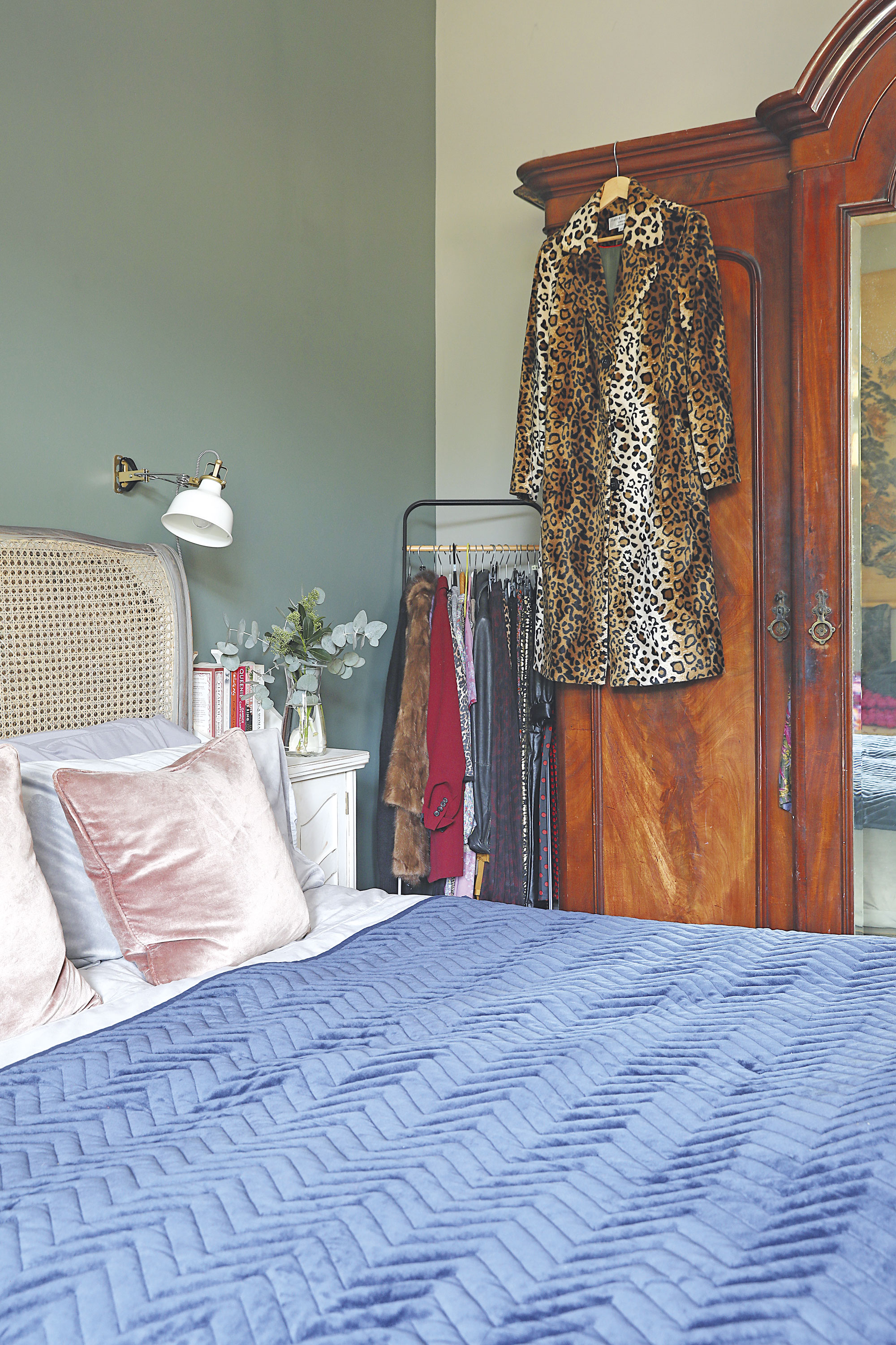 Home makeover: 'Our style is a modern take on traditional' ‘I love the rattan French vintage feel of the bed, which I stock in my shop, Rose & Lee Interiors. The vintage bedside tables were sourced at an antiques market and the blue throw is by Broste Copenhagen’