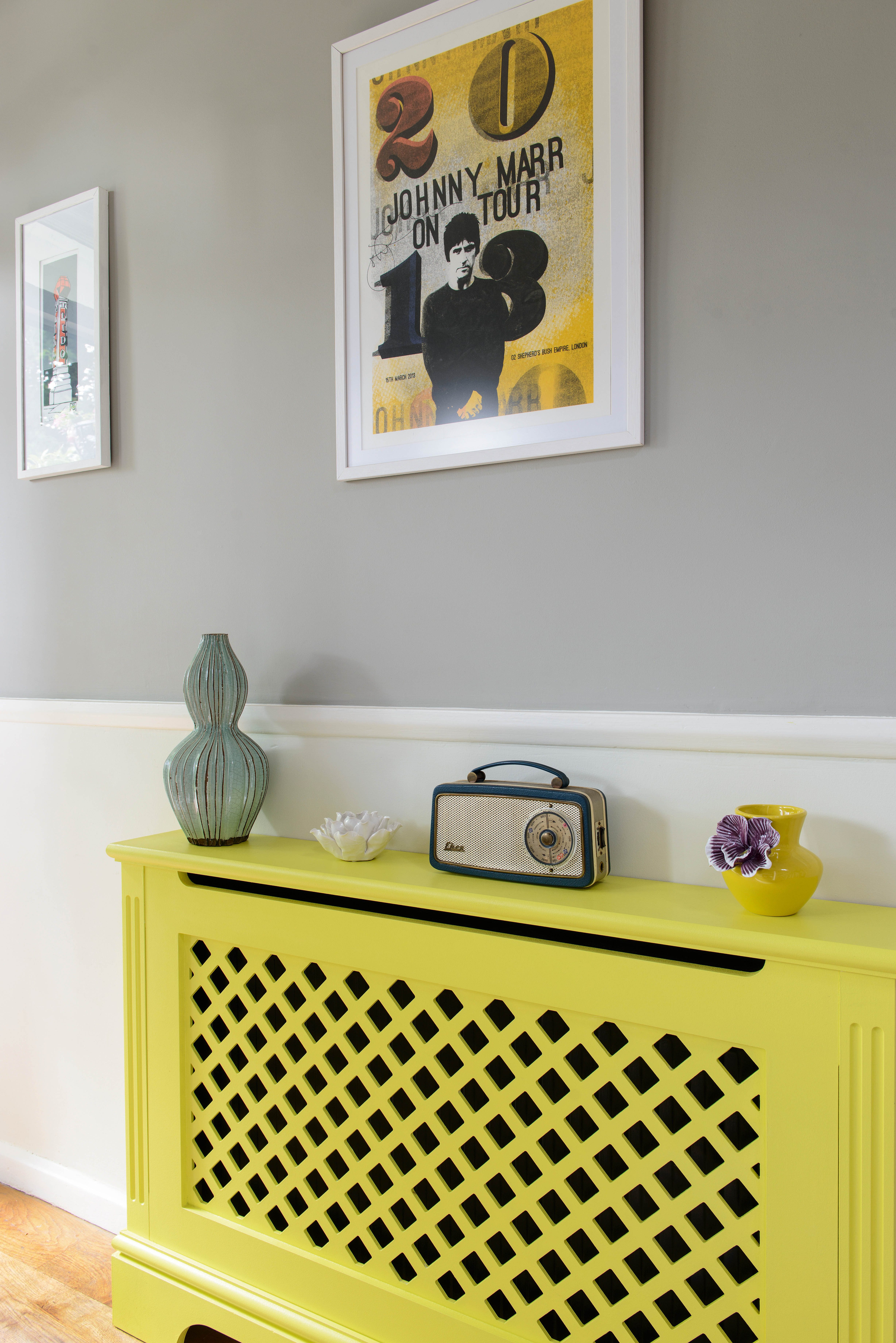 Horn_stairs ADJ009 An an old radiator covered and painted bright yellow