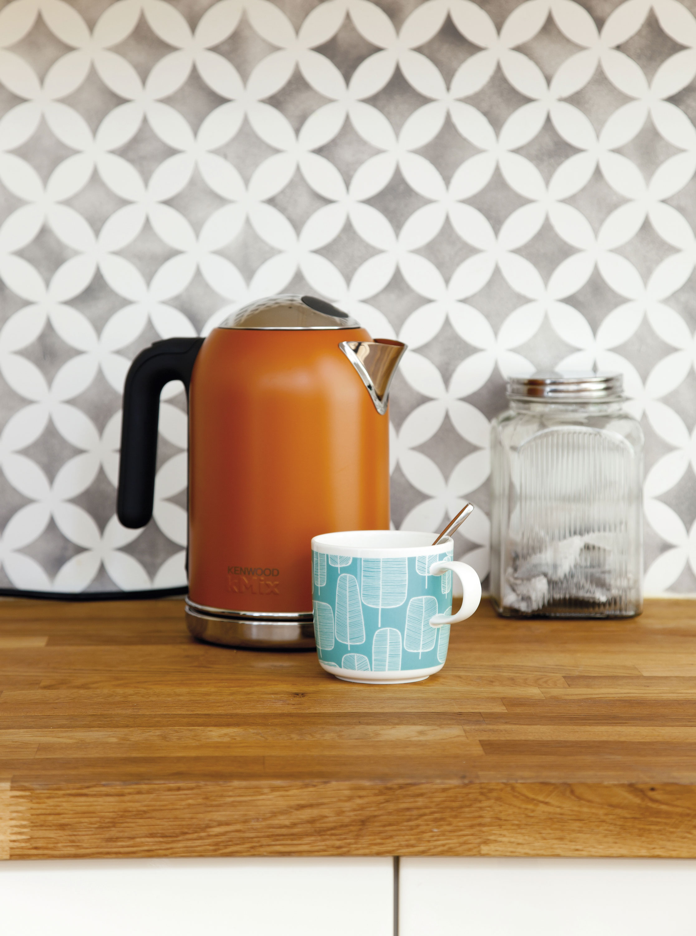 It cost just £42 to stencil a pattern that looks like tiles. Make sure you use wipeable kitchen paint so the walls are protected, and the design will last It cost just £42 to stencil a pattern that looks like tiles. Make sure you use wipeable kitchen paint so the walls are protected, and the design will last