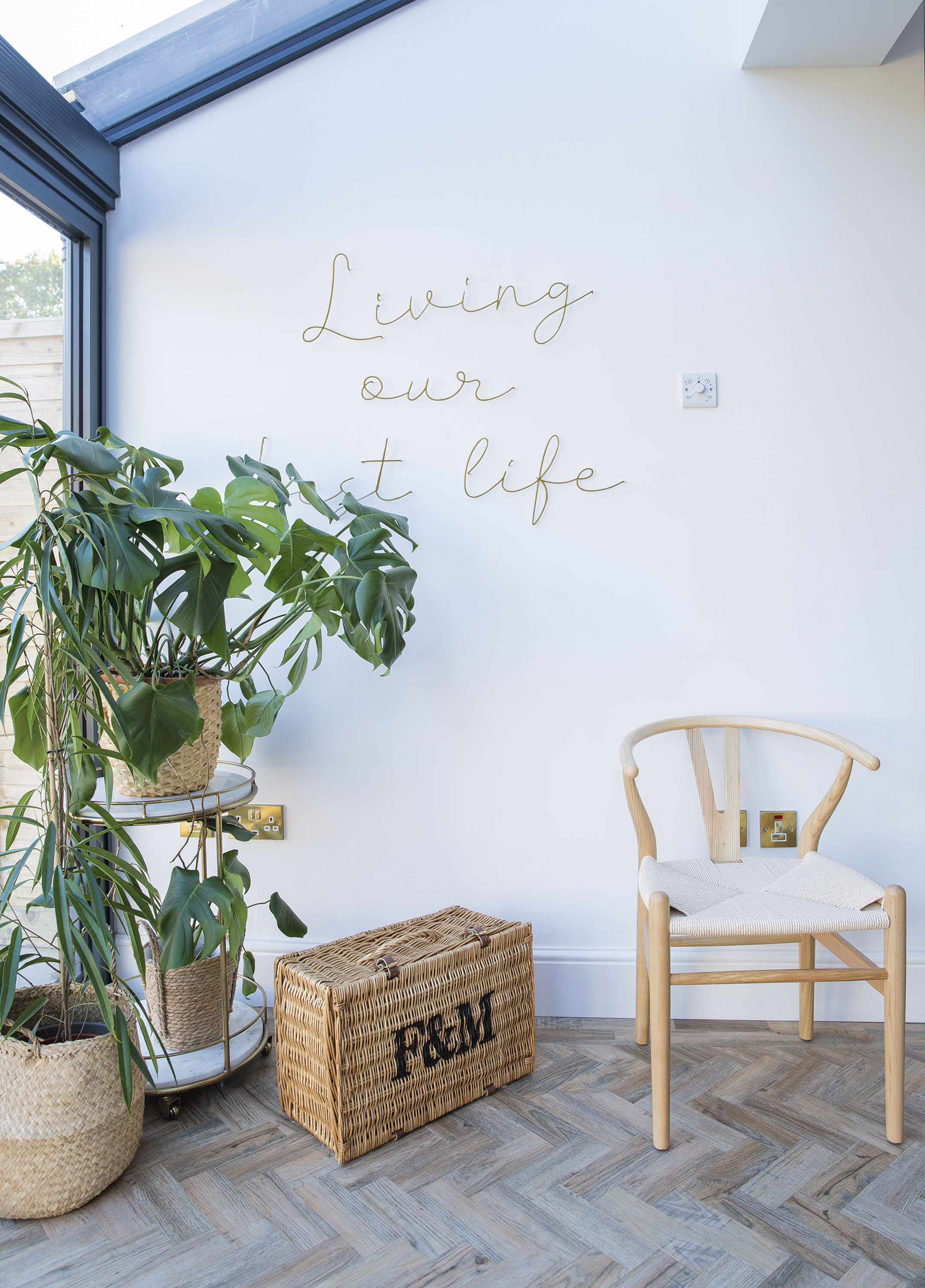 ‘I’m a big fan of plants – they help add a bit of life and colour to the room. My light-up wall letters are from Luxe Lettering UK and add a pretty glow at night’ Home makeover: 'I knew it would be the perfect home'