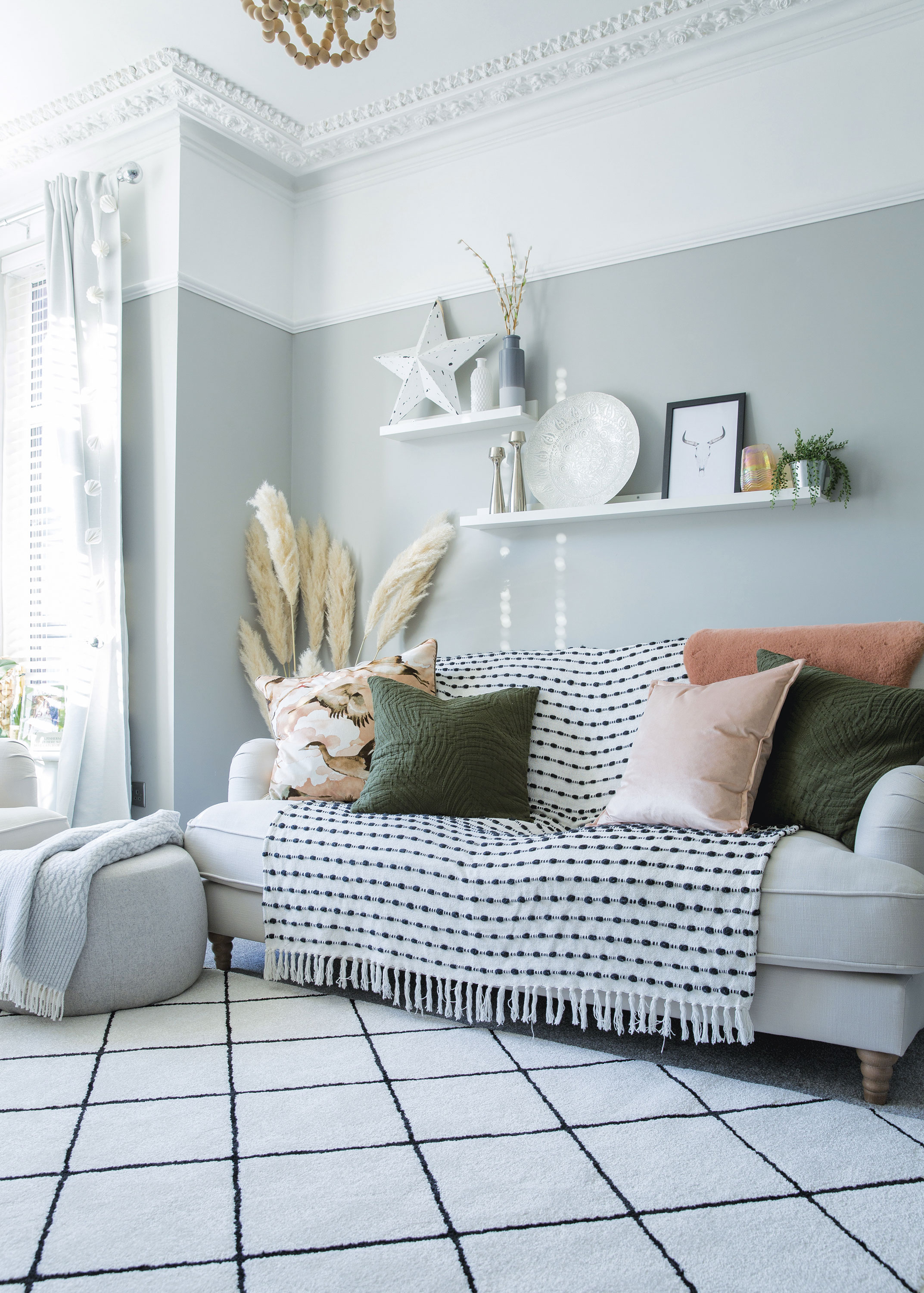 ‘We picked the house because of the high ceilings and this room has a typical Victorian feel. We kept the scheme neutral with pastel walls and a soft grey carpet from Cormar’ Home makeover: 'I knew it would be the perfect home'