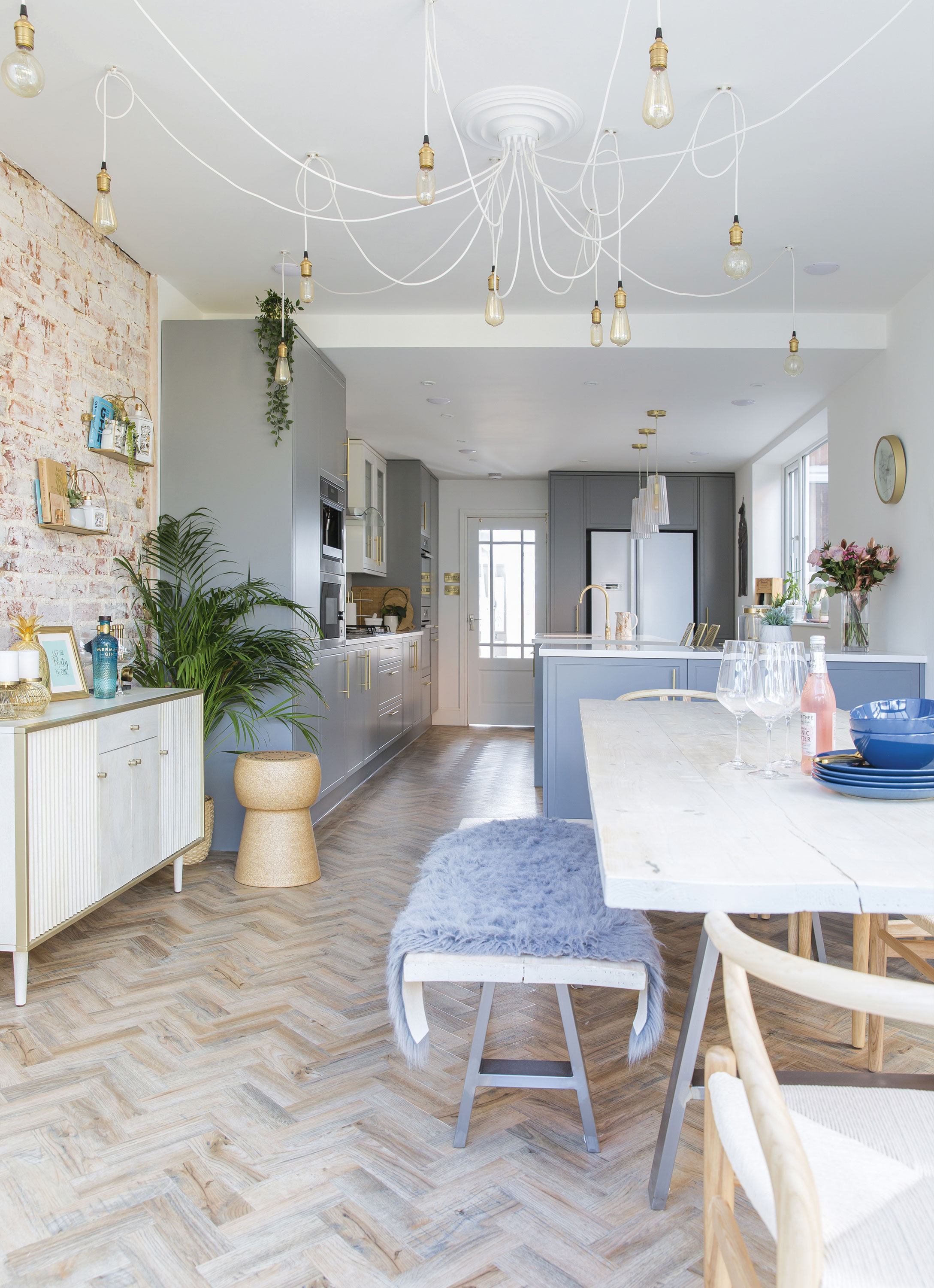 Mike made the dining table from old scaffold planks finished with metal trestle legs. A wooden bench is perfect for fitting everyone around the table Home makeover: 'I knew it would be the perfect home'
