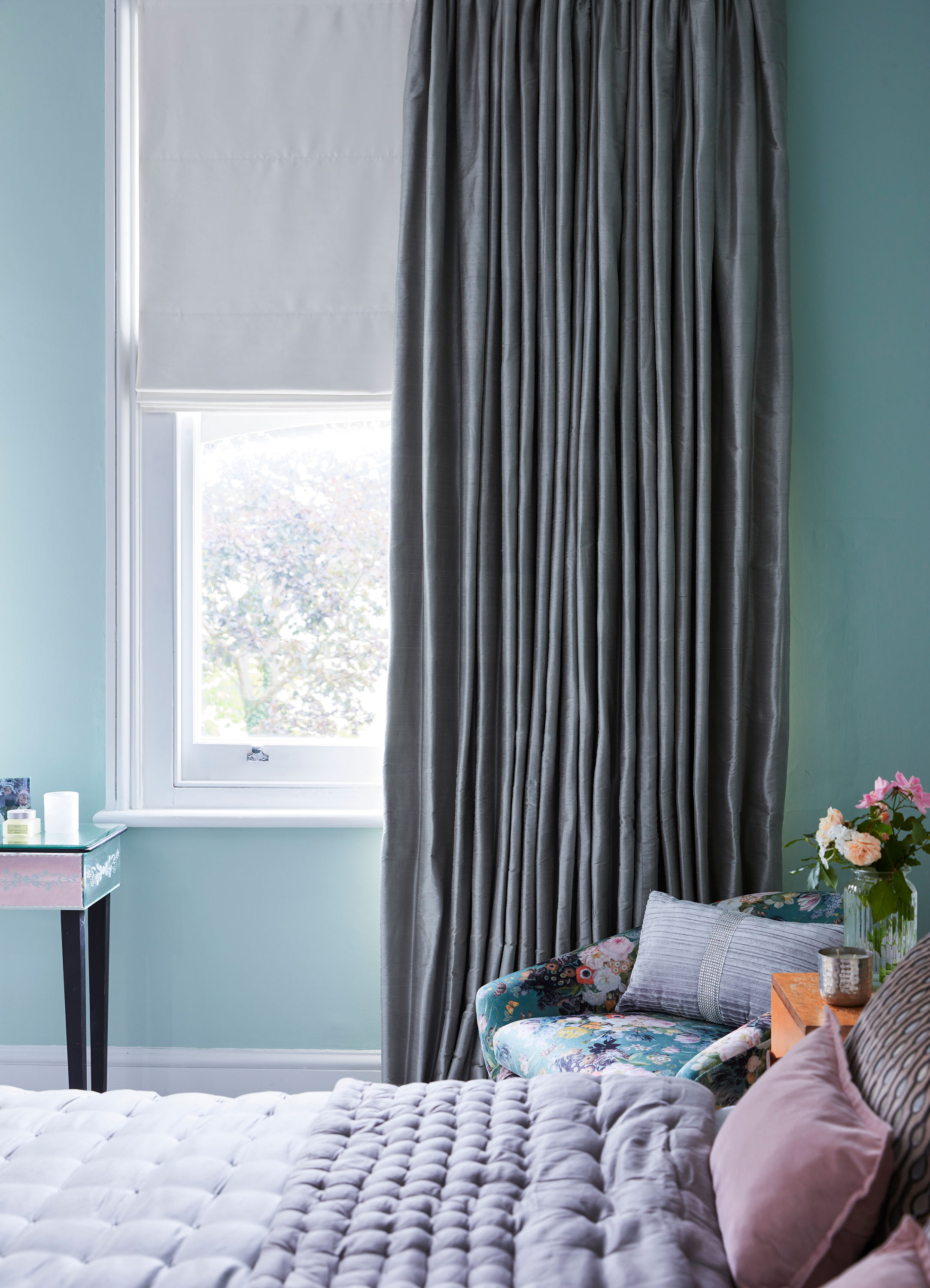 The addition of a comfy chair is a bedroom must, and whilst Beverley’s choice of a patterned chair may be a brave one, it ties in perfectly with the colours in the room