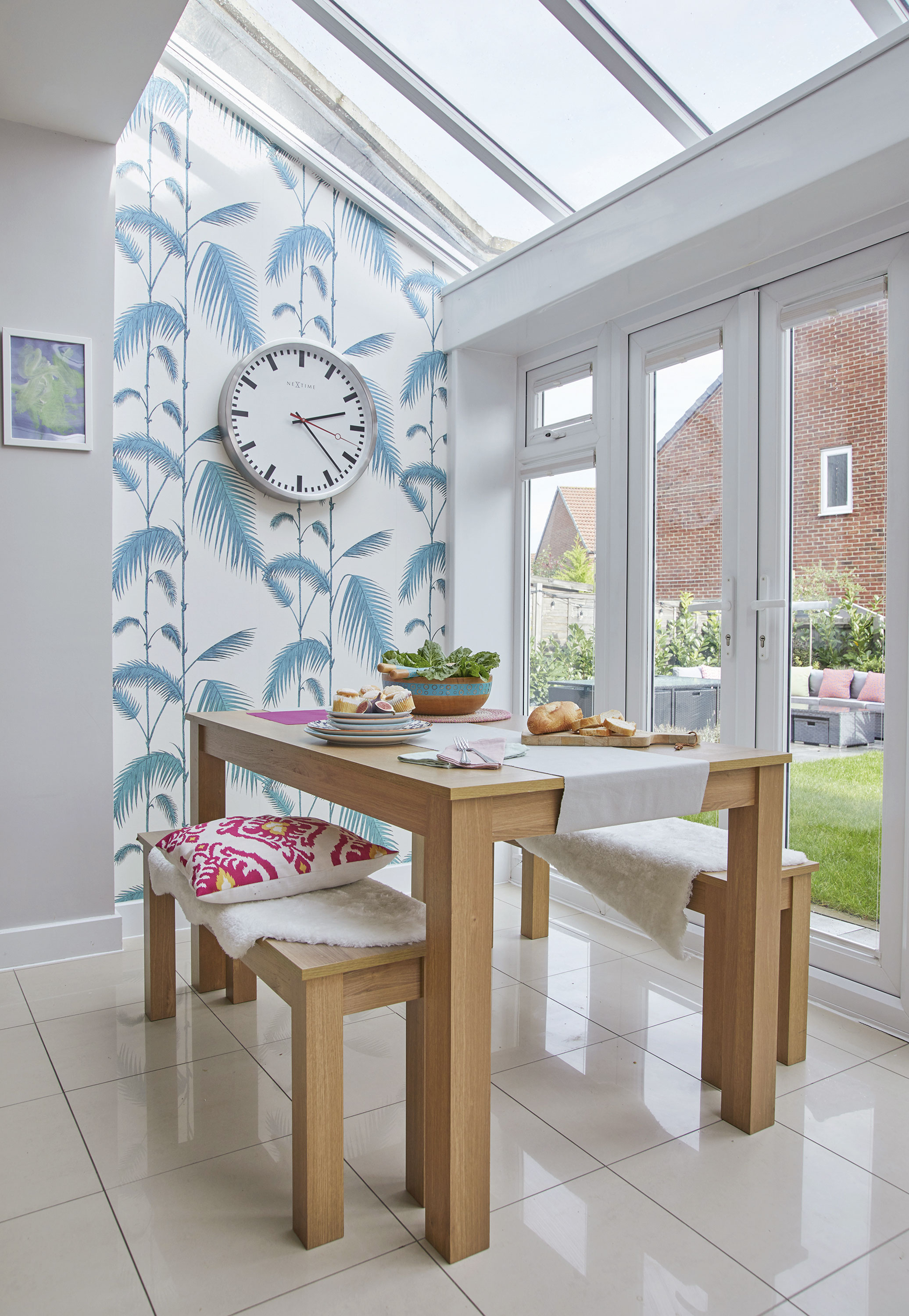 ‘I bought this Cole & Son wallpaper from eBay but there was only one roll. I wasn’t sure where to use it, and initially thought it might go in the bathroom, but it works really well here. We bought the dining set off the previous owners as it works well in the space’ ‘I bought this Cole & Son wallpaper from eBay but there was only one roll. I wasn’t sure where to use it, and initially thought it might go in the bathroom, but it works really well here. We bought the dining set off the previous owners as it works well in the space’