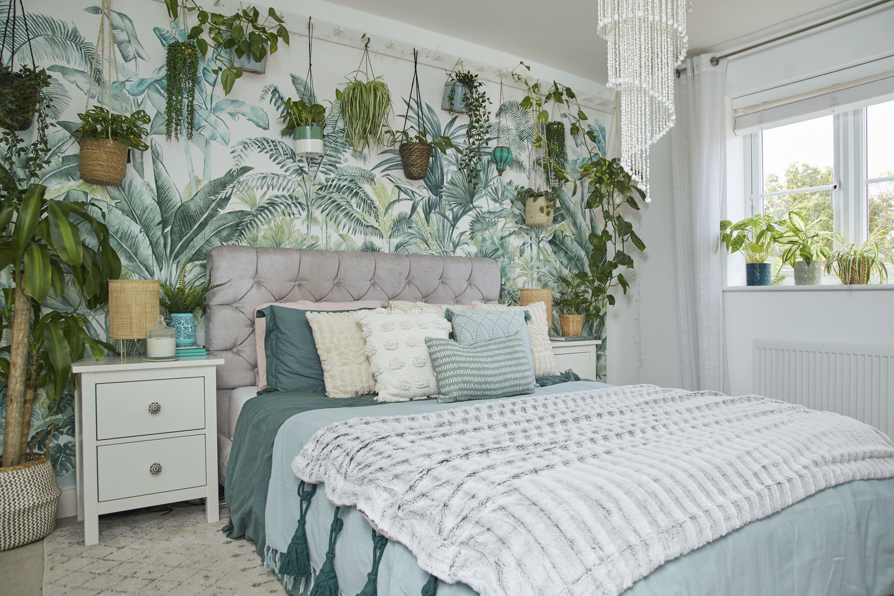 ‘The bedside cabinets are from IKEA, but I’ve changed the handles to give them an original twist. The bed was a cheap eBay find’