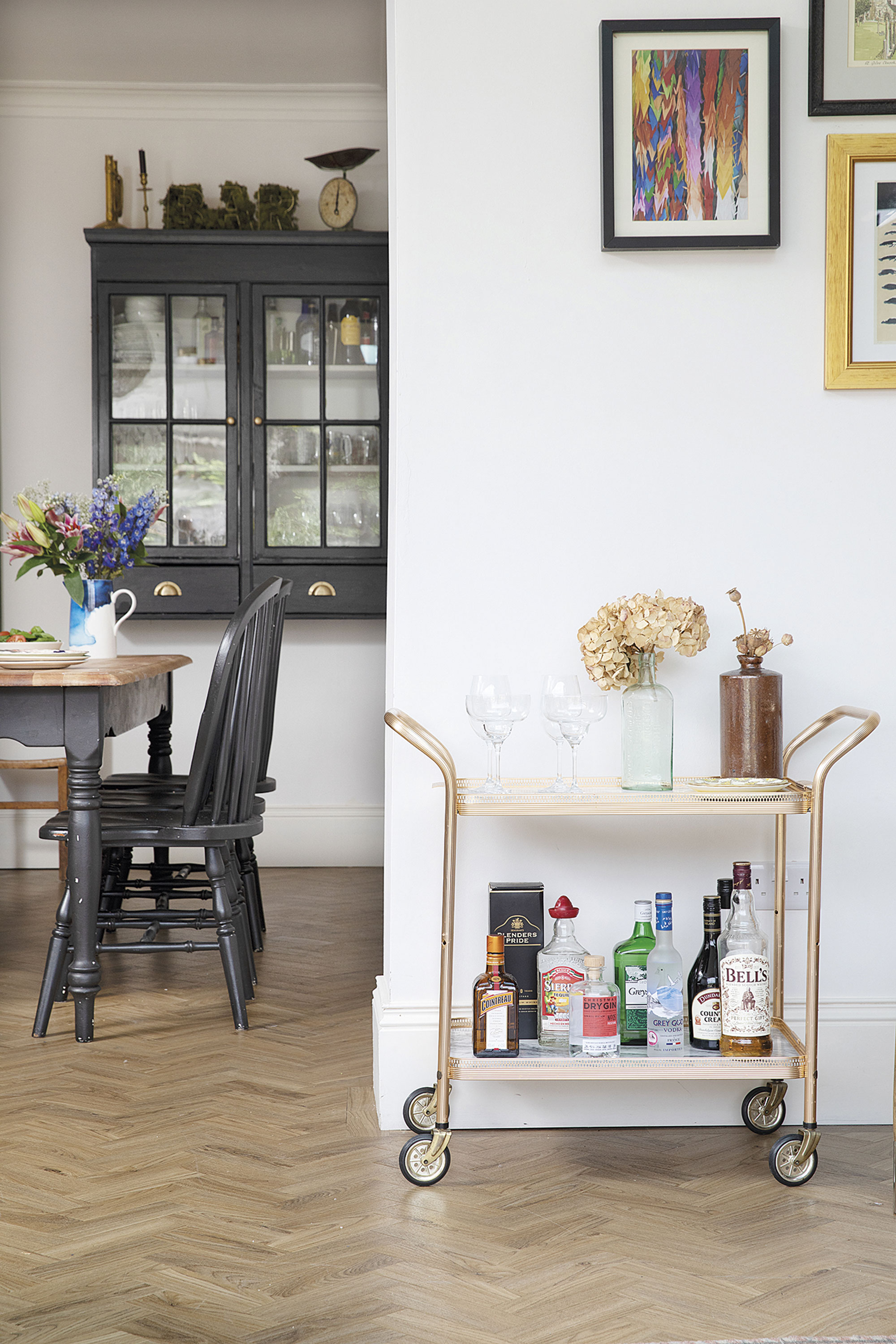 ‘We inherited the bar cart from Gareth’s grandma,’ says Sam. ‘I upcycled the top with some marble-effect adhesive vinyl’ ‘We inherited the bar cart from Gareth’s grandma,’ says Sam. ‘I upcycled the top with some marble-effect adhesive vinyl’