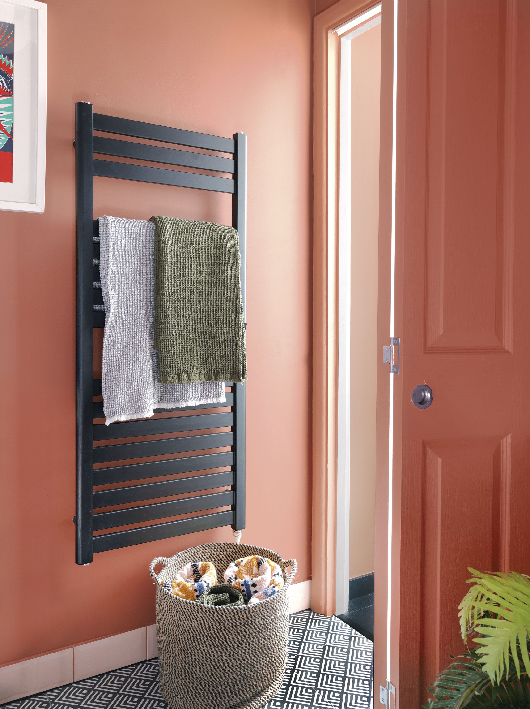 Bath_10201Riannon chose Tuscan Red emulsion by Little Greene for the walls and Farrow & Ball’s Red Earth for the folding door, to create a slight contrast. The heated towel rail from Drench was chosen for its flat design and to tie in with the black fittings elsewhere Riannon chose Tuscan Red emulsion by Little Greene for the walls and Farrow & Ball’s Red Earth for the folding door, to create a slight contrast. The heated towel rail from Drench was chosen for its flat design and to tie in with the black fittings elsewhere