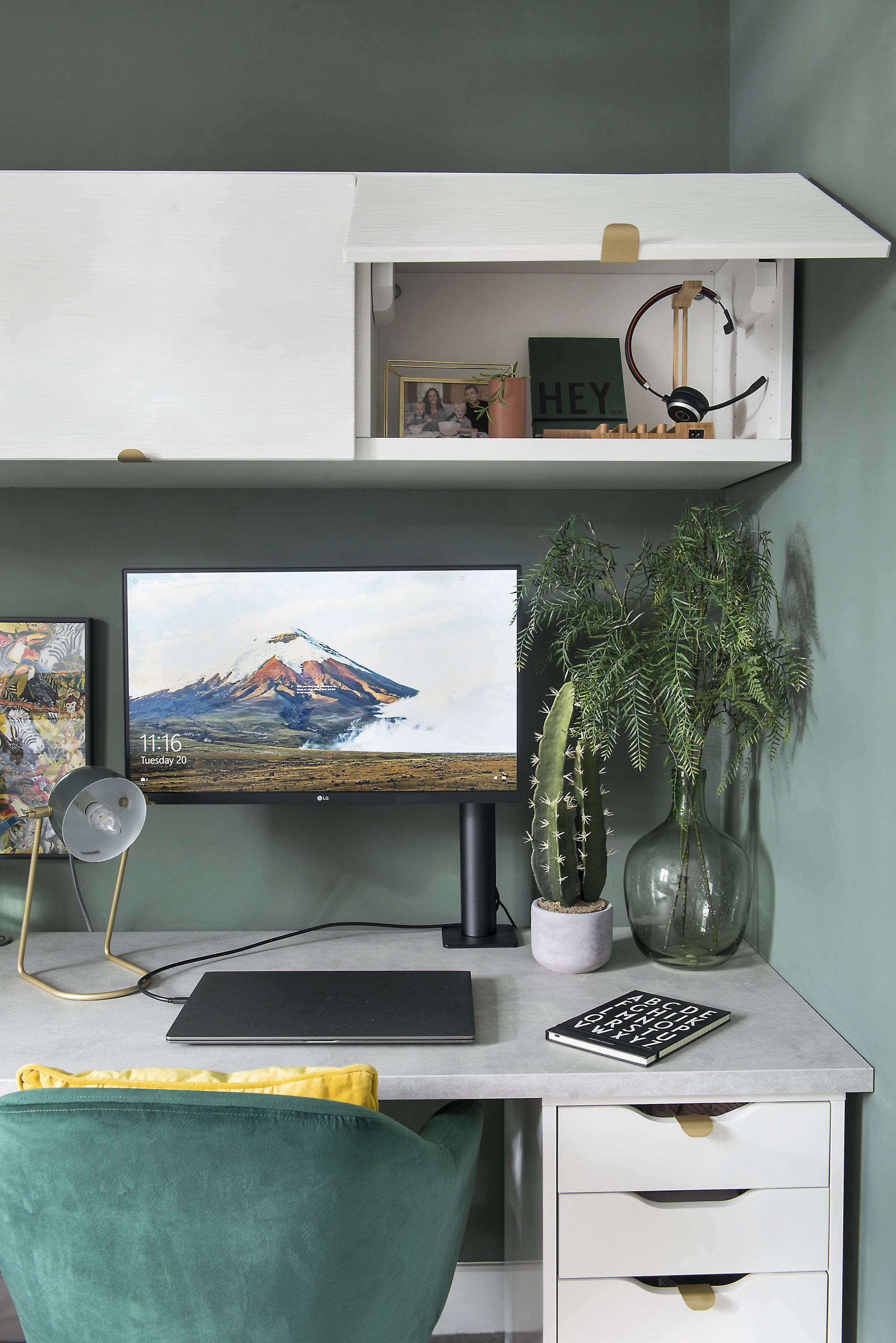Lift-up doors make the wall storage easy to access. The units open and close on neat push-catches, giving the furniture the sleek, stylish edge Lydia wanted