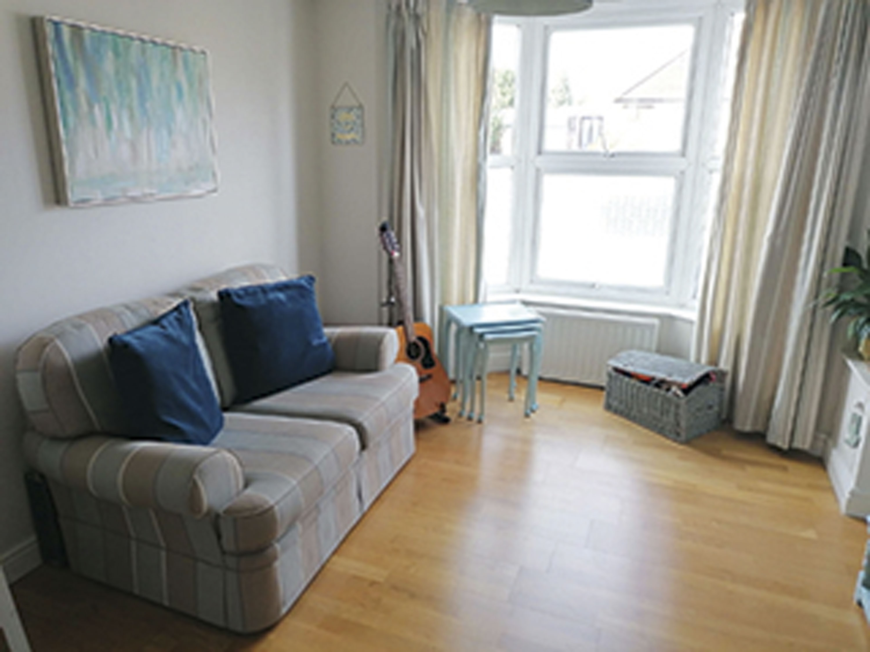 Erika's room before the makeover Living room makeover: 'We were inspired by bright Scandi designs'