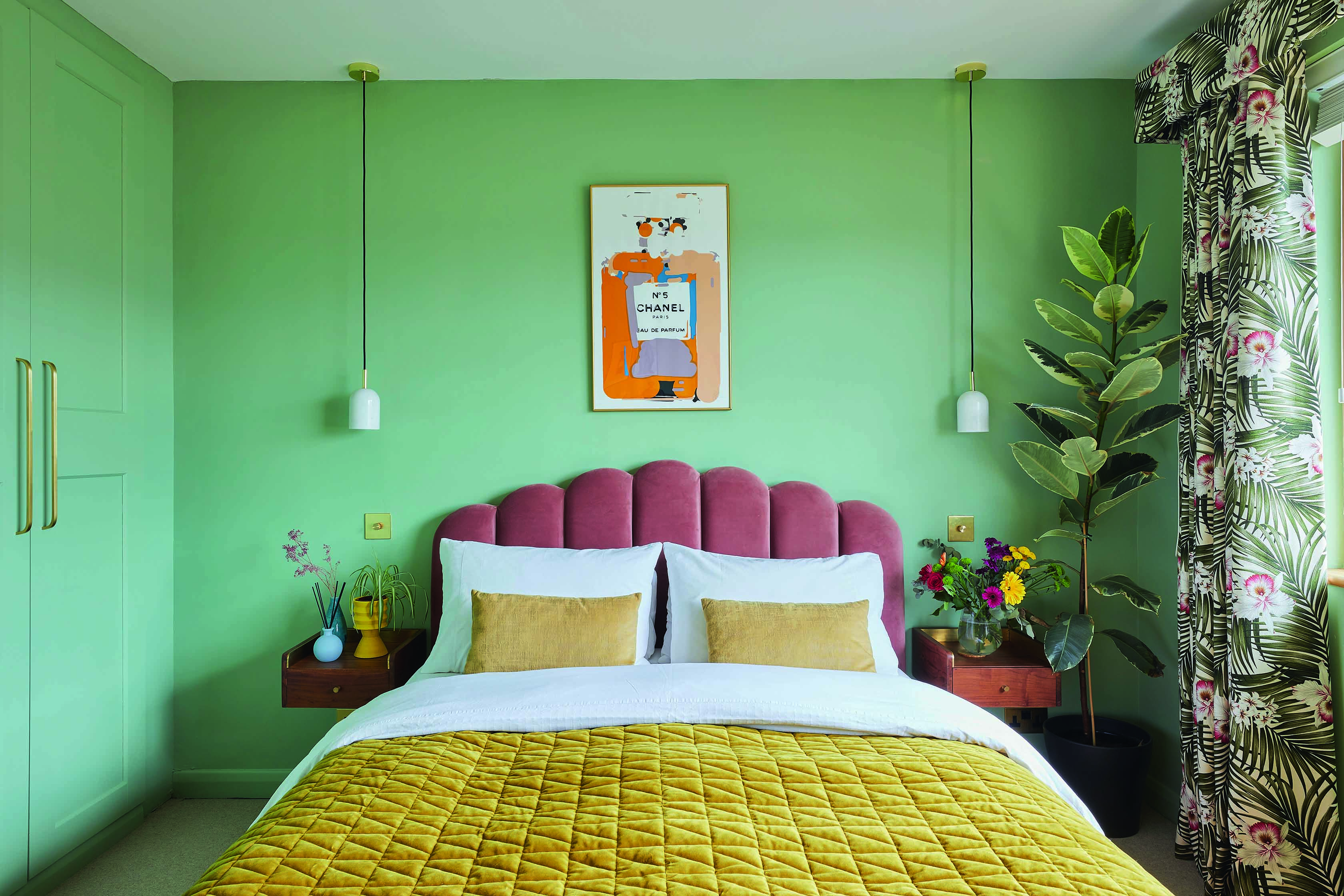 Bo House2518 The master bedroom has been painted in Pea Green from Little Greene. Hanging wall lights from MADE.com and floating bedside tables are stylish space savers