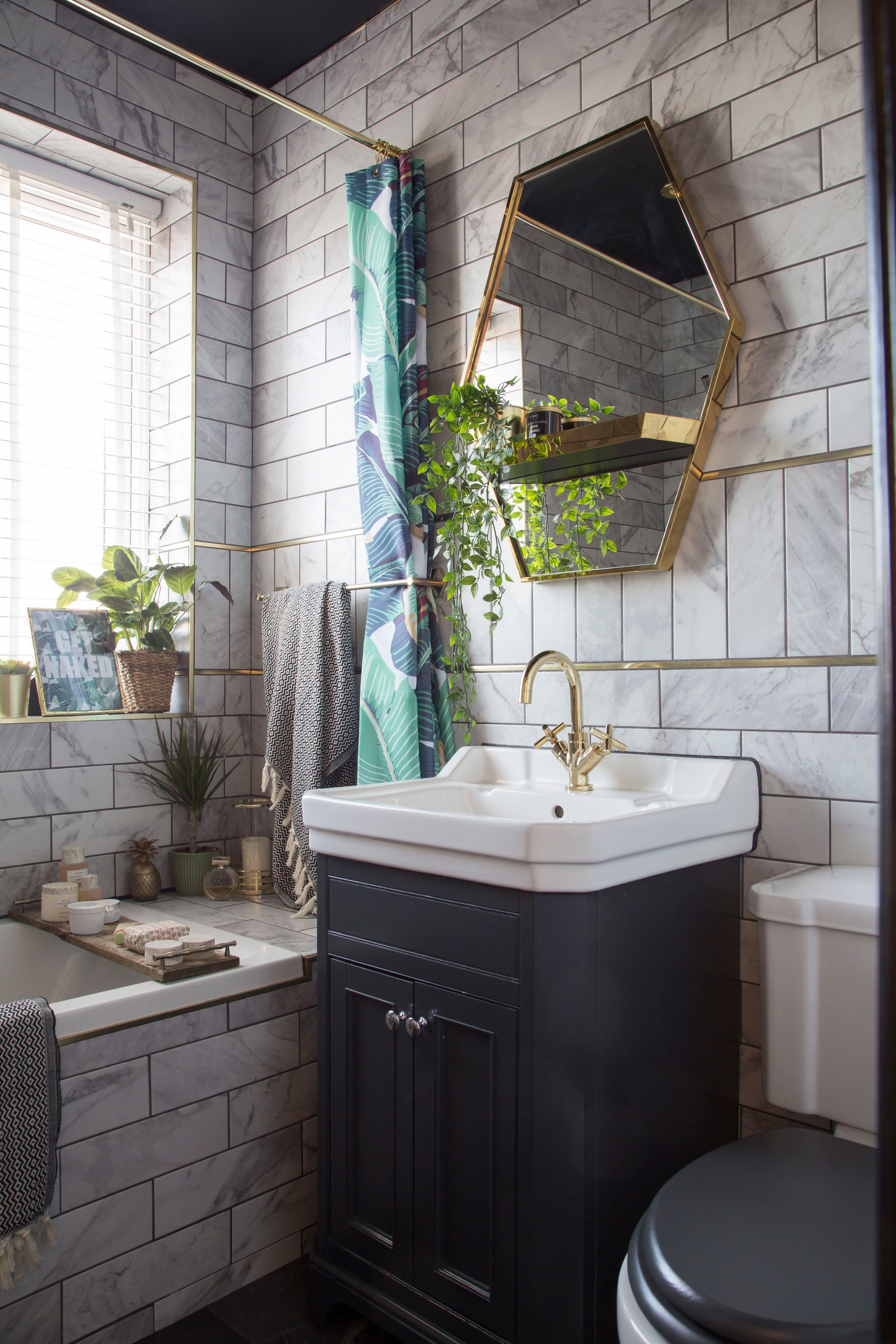 ‘I decided, while designing the new bathroom, that I wanted marble, but I didn’t want to pay marble prices,’ says Kirstie. ‘I also wanted something durable that wouldn’t stain, so I opted for a marble-effect tile that gave me the look I was after for much less’ ‘I decided, while designing the new bathroom, that I wanted marble, but I didn’t want to pay marble prices,’ says Kirstie. ‘I also wanted something durable that wouldn’t stain, so I opted for a marble-effect tile that gave me the look I was after for much less’